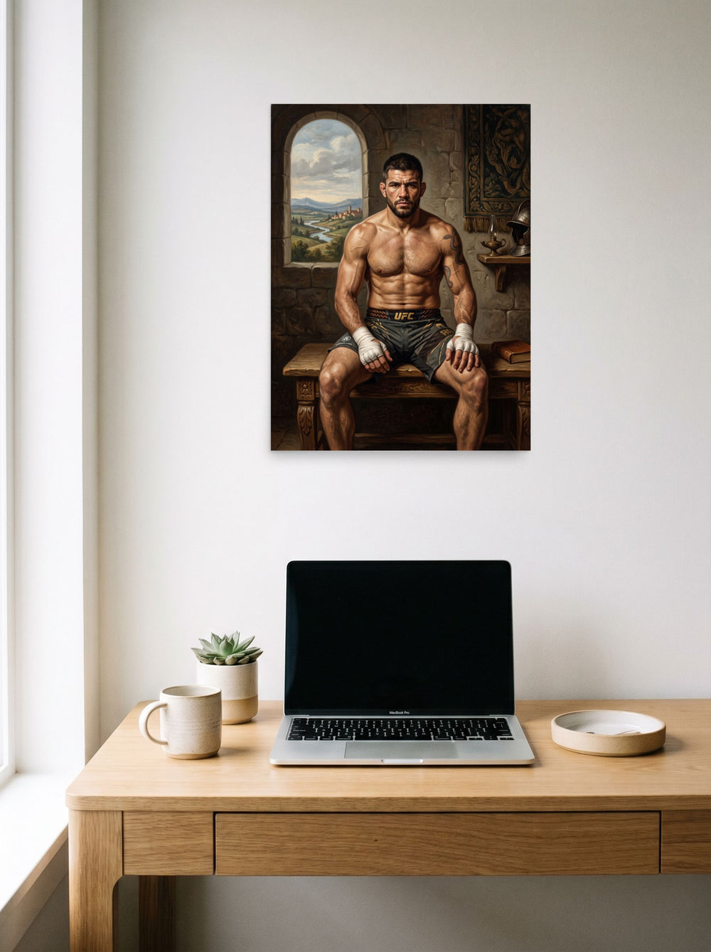 A 18x24 inch unframed paper version of 'The Renaissance Gladiator', Renaissance wall art, hanging above a worktable with a laptop.