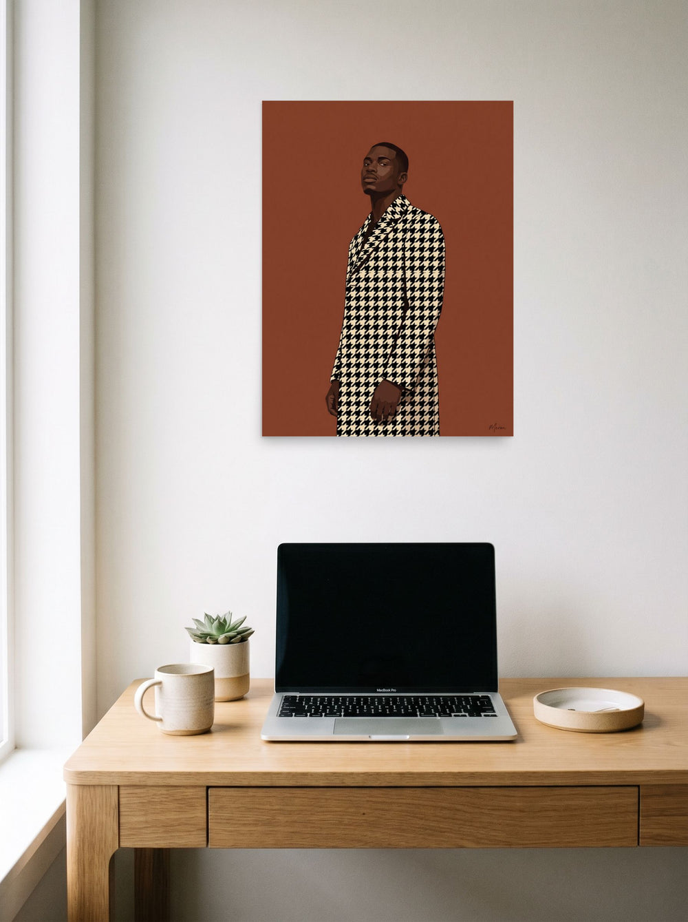 A 18x24 inch unframed paper Figurative art,Realism print of 'Houndstooth Elegance' hanging above a worktable with a laptop.