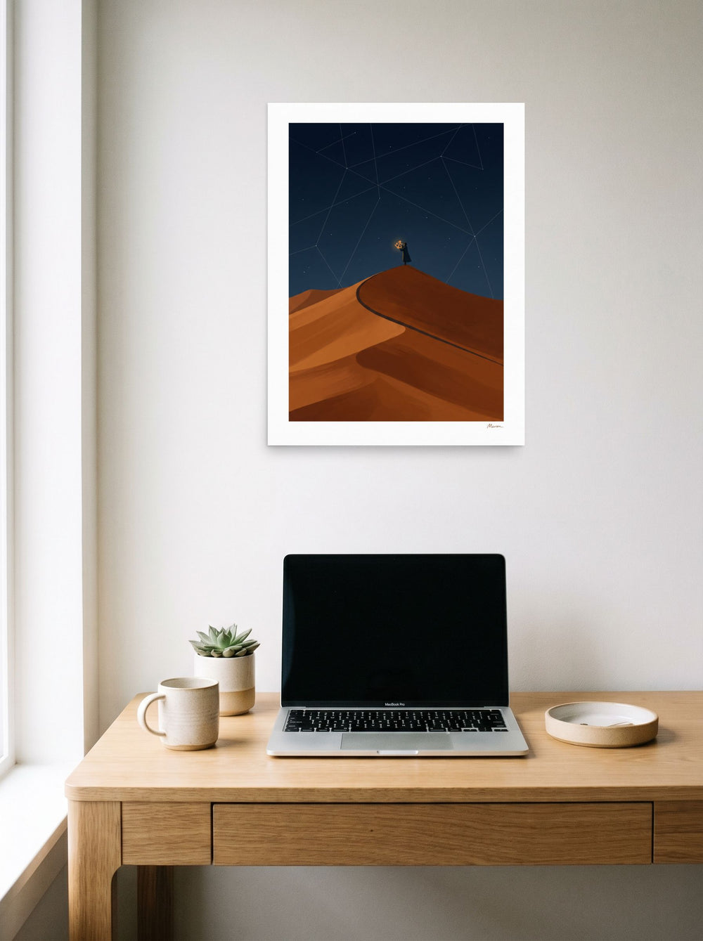 'The Desert Astronomer' in 18x24 inch unframed paper, displayed over a compact desk setup.