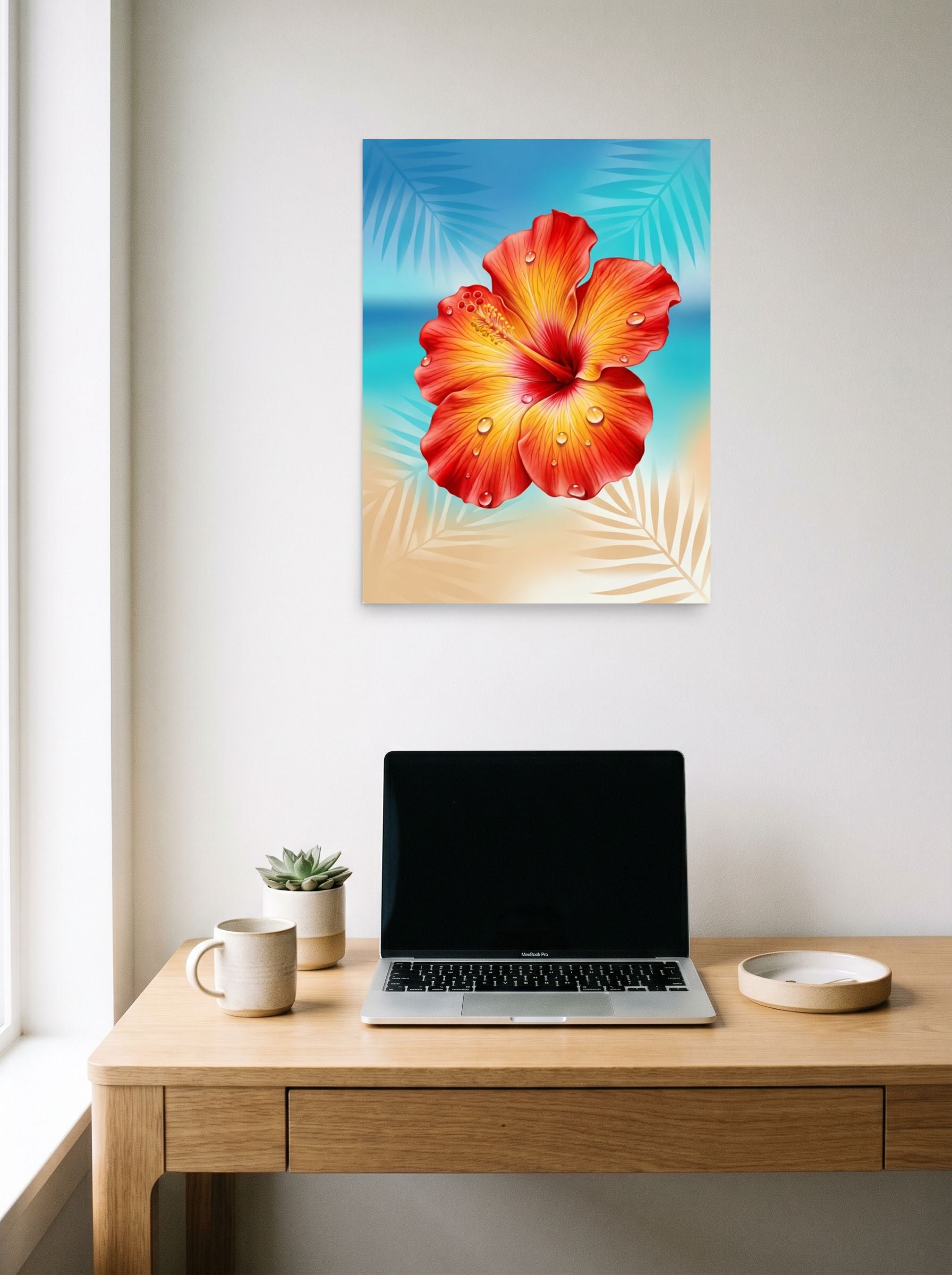 A 18x24 inch unframed paper Realism print of 'Radiant Hibiscus' hanging above a worktable with a laptop.
