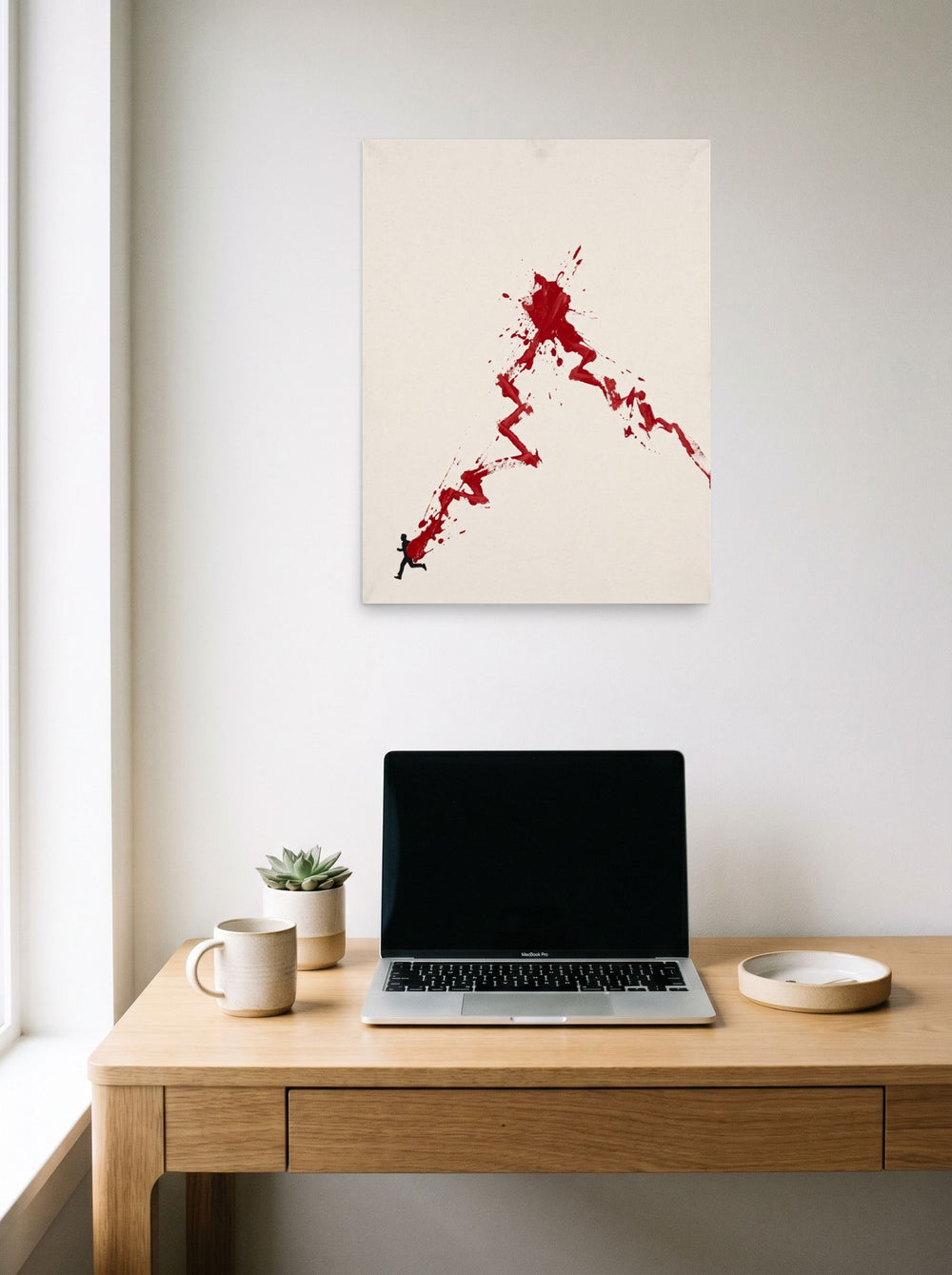 The unframed paper print 'The Surge of Momentum' styled above a home-office workspace, shown at 18x24 inch.