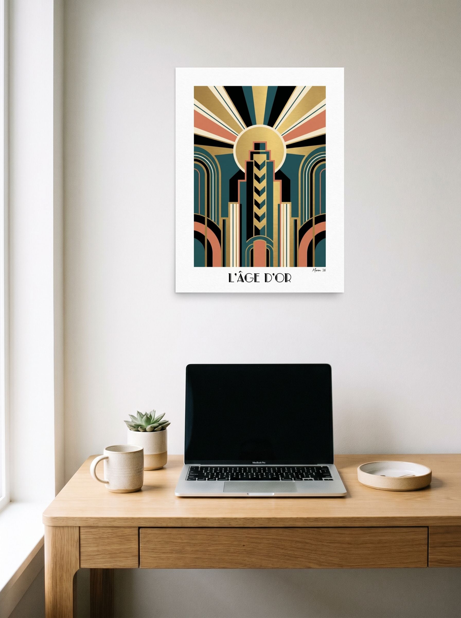 A 18x24 inch unframed paper Art Deco print of 'Metropolis 1930' hanging above a worktable with a laptop.