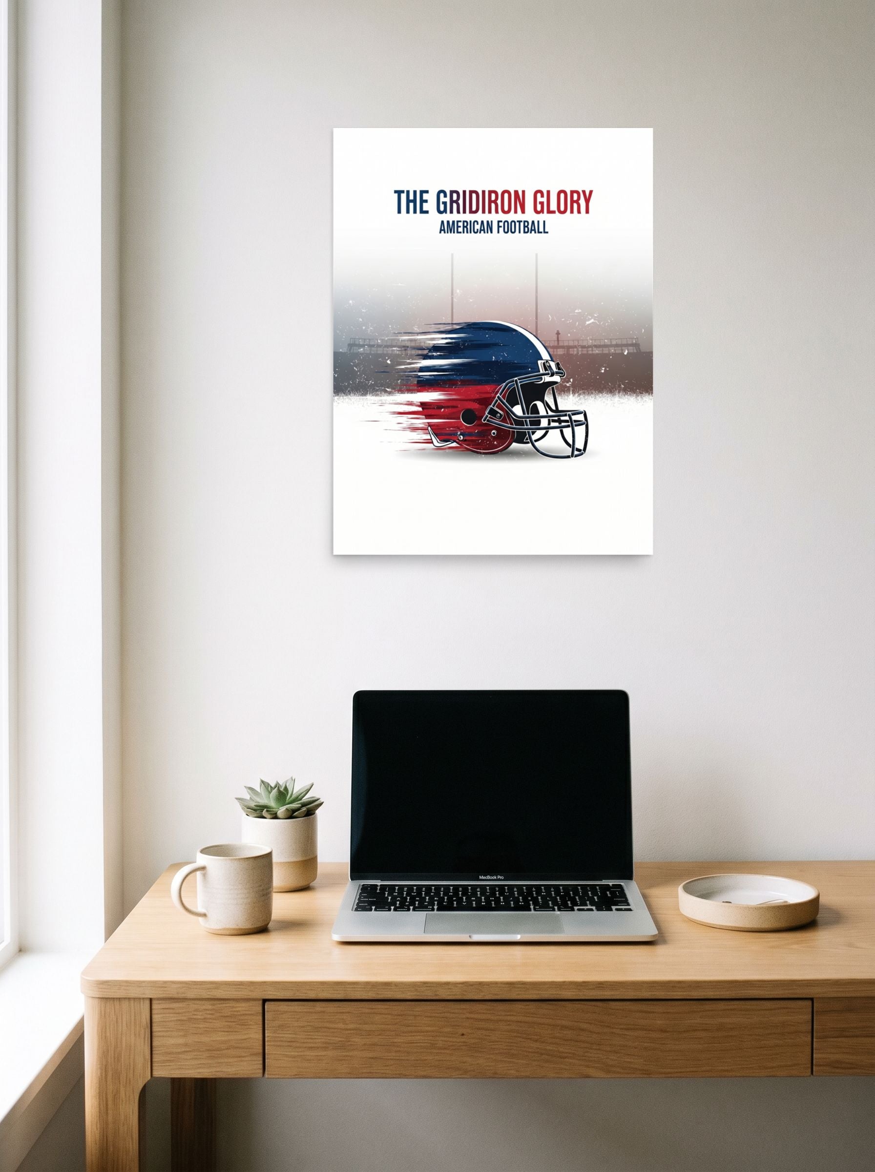 A 18x24 inch unframed paper Digital art print of 'The Gridiron Glory' hanging above a worktable with a laptop.