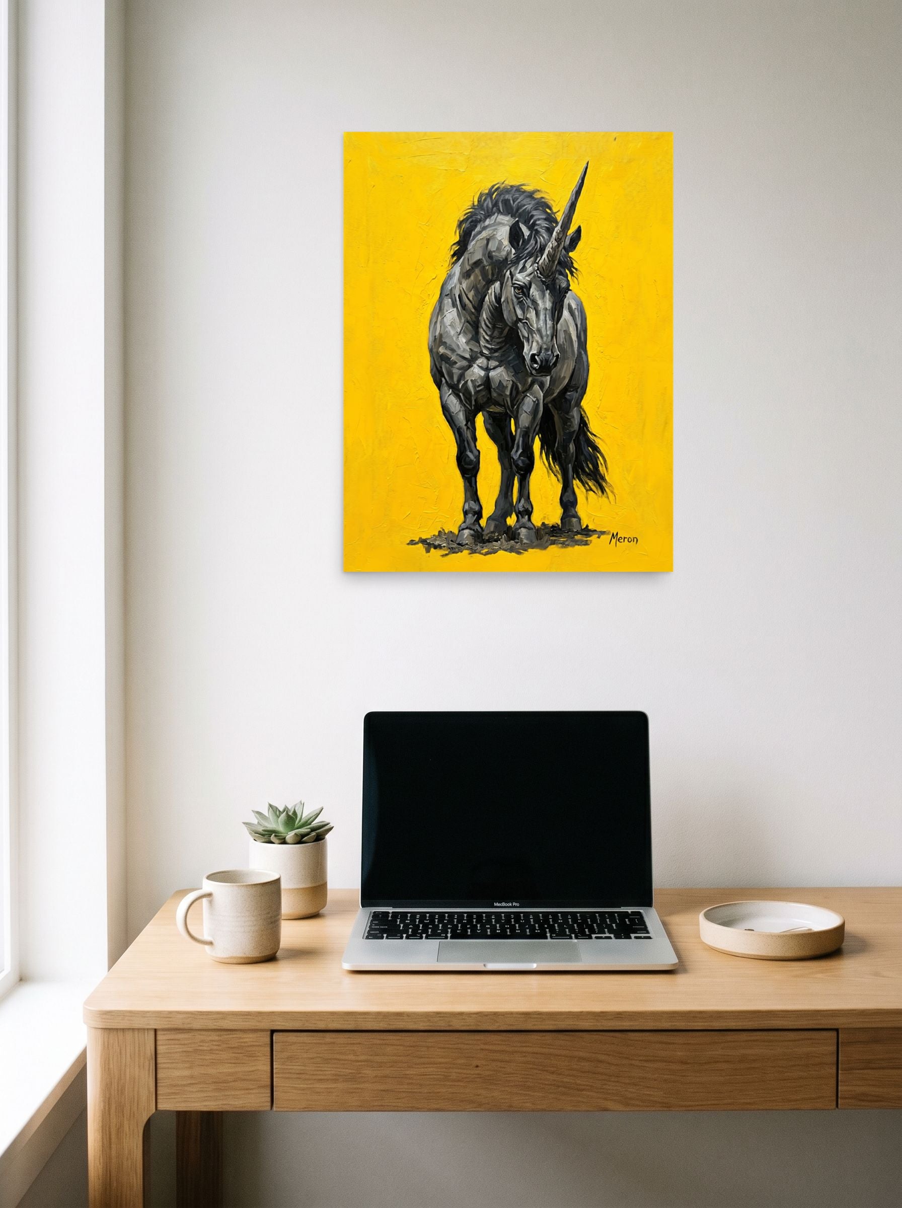 A 18x24 inch unframed paper Expressionism print of 'The Iron Horn' hanging above a worktable with a laptop.