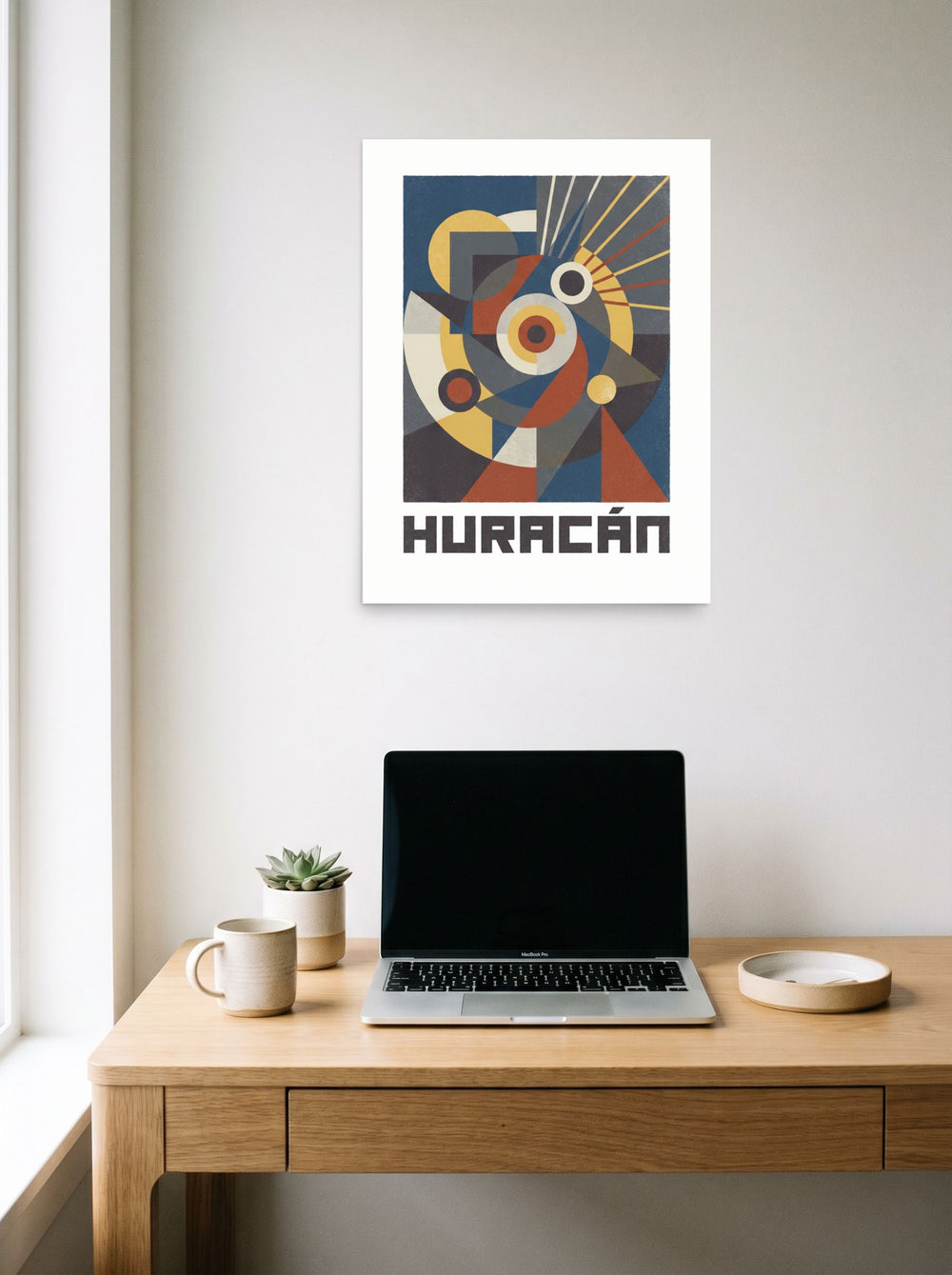 Bauhaus wall art 'Huracán Geometric Poster', unframed paper at 18x24 inch, displayed over a compact desk setup.