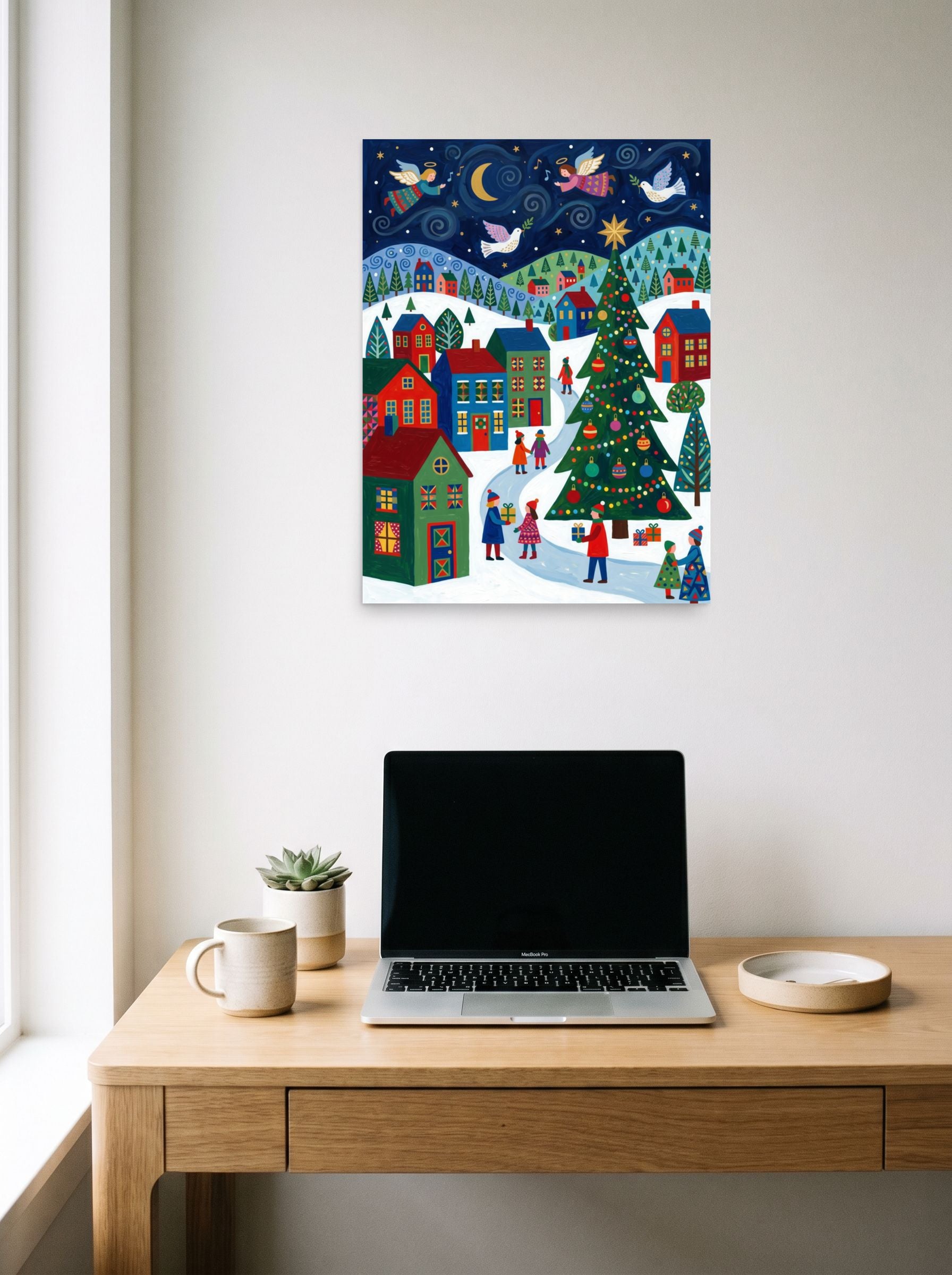 A 18x24 inch unframed paper Naive art print of 'Starry Night Angels' hanging above a worktable with a laptop.