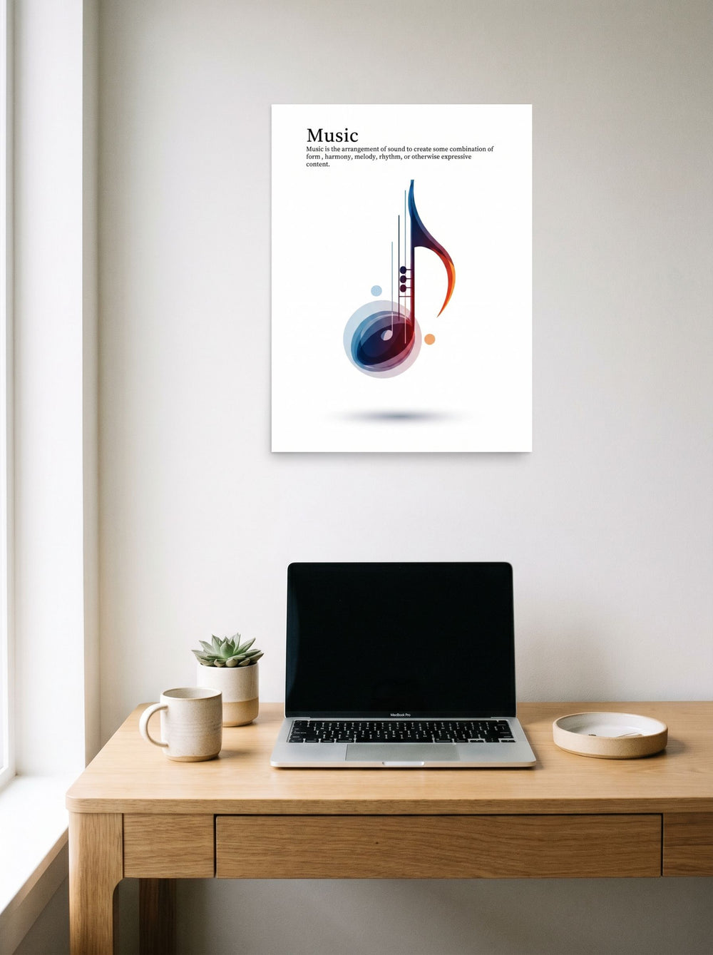 A 18x24 inch unframed paper Abstract art,Pop art print of 'The Color of Music' hanging above a worktable with a laptop.