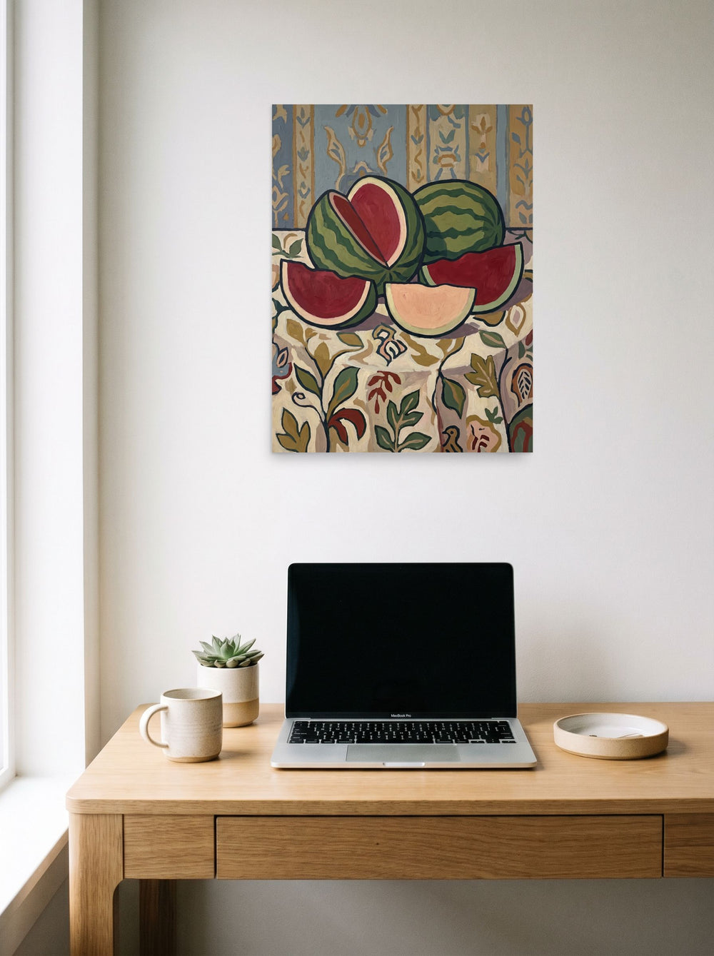 'Watermelon Still Life with Ornate Wallpaper', a Les Nabis print hanging above a worktable with a laptop. Shown as unframed paper, 18x24 inch.