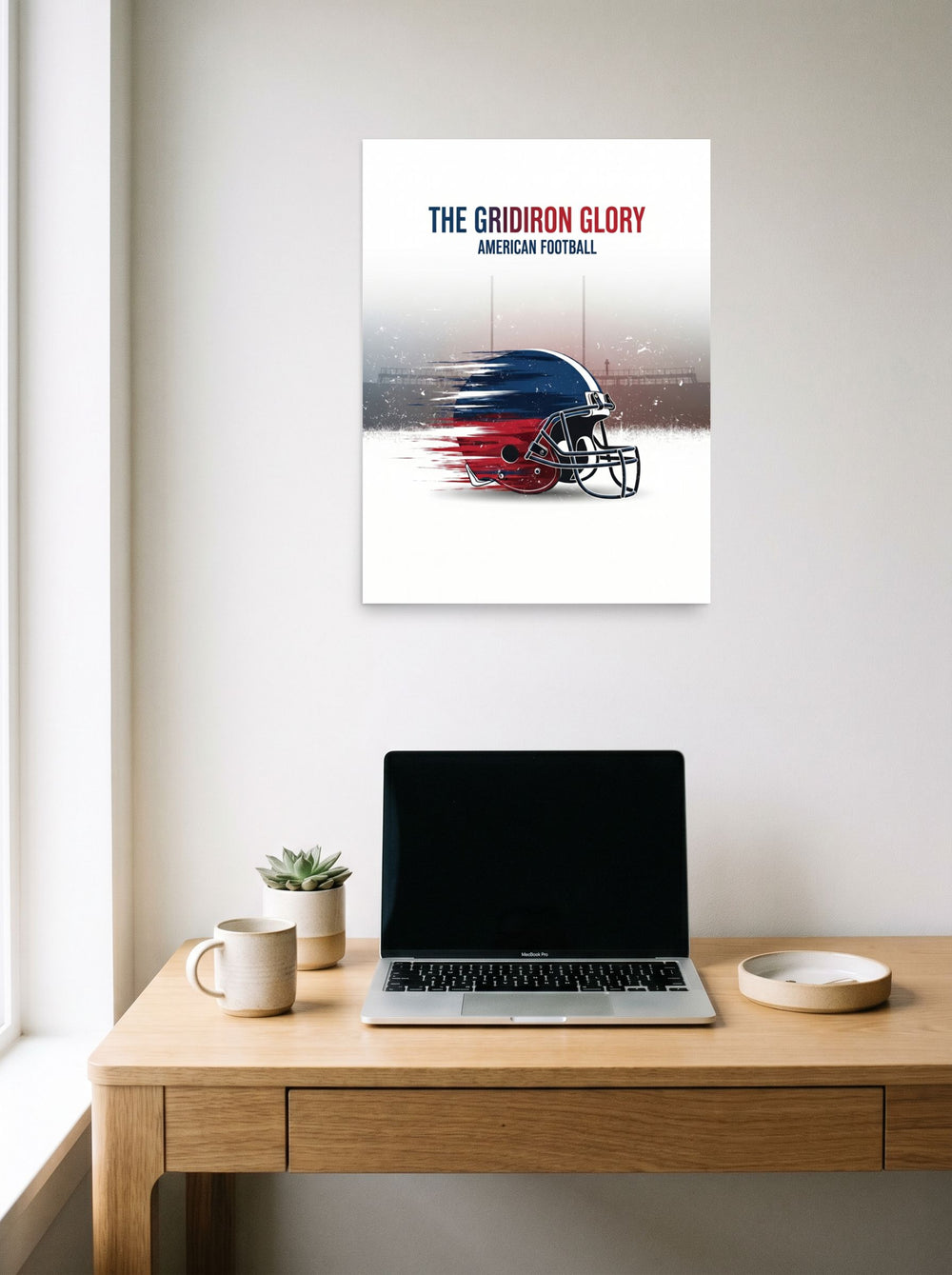 A 18x24 inch unframed paper Digital art print of 'The Gridiron Glory' hanging above a worktable with a laptop.