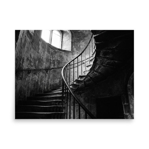 'Ascending Shadows' — a Art photography print. A black and white photograph of a winding stone staircase bathed in dramatic natural light, an elegant focal point for a Hallway.