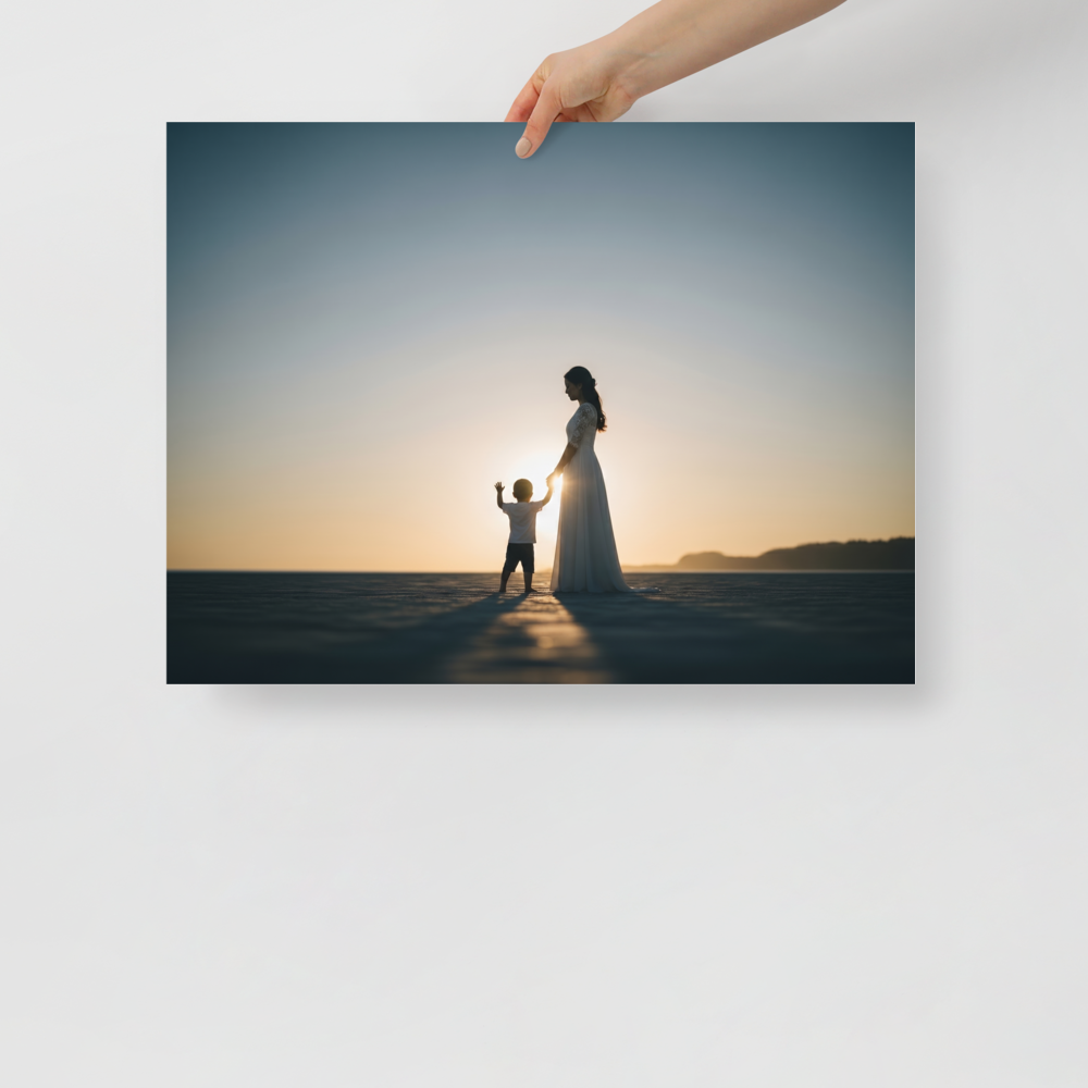'Sunset Bond' — a Art photography print. A warm sunset silhouette of a mother in a long dress holding her child's hand on a wide beach, a beautiful and emotional piece for a cozy Bedroom.