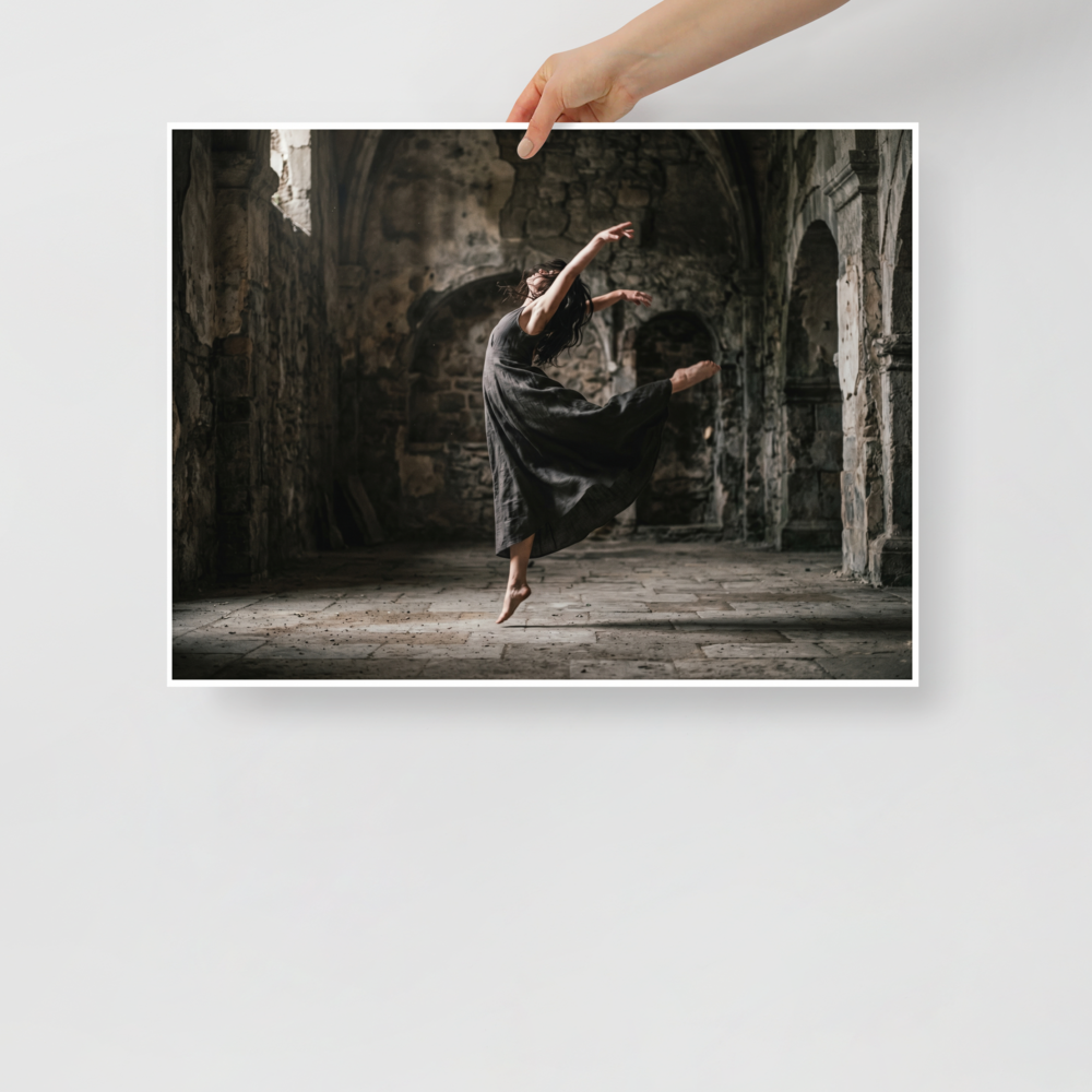 'Grace in the Ruins' — a Art photography print. A photograph of a dancer leaping gracefully in a dark flowing dress inside a ruined stone building, bringing a sense of movement to a Living Room or Studio.