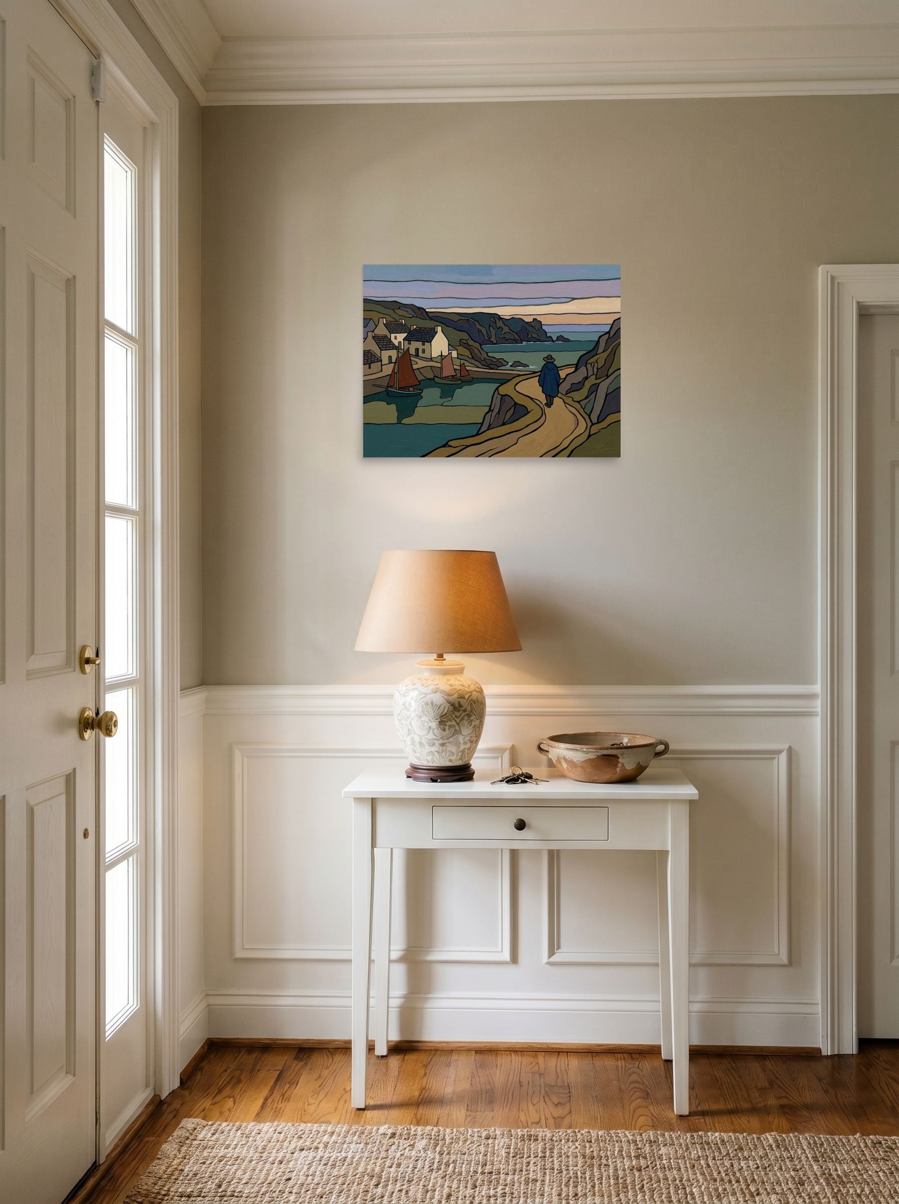 A 24x18 inch unframed paper Cloisonnism print of 'The Winding Coastal Path' hanging in an entryway near a console.