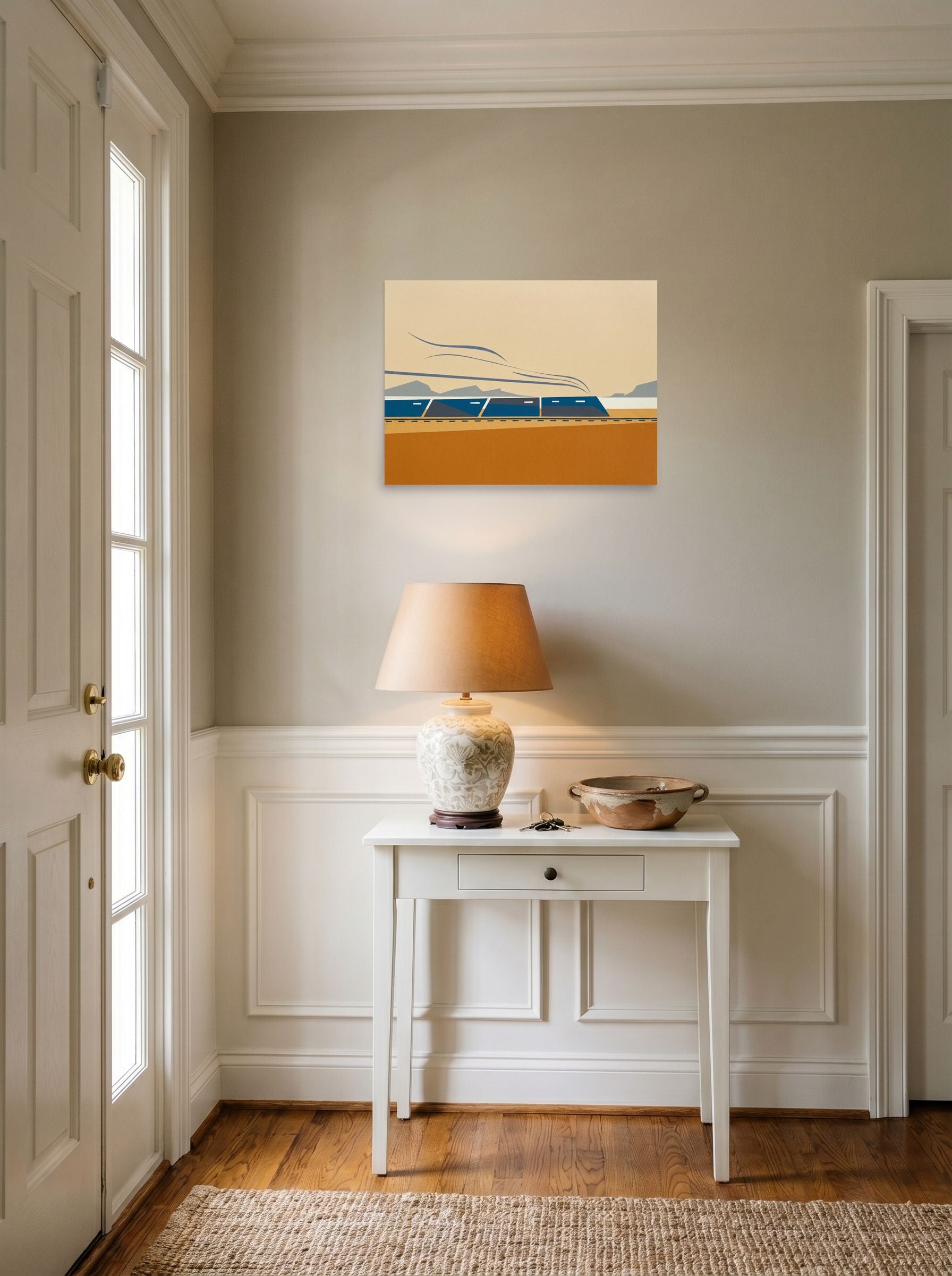 A 24x18 inch unframed paper Minimalism print of 'The Coastal Express' hanging in an entryway near a console.