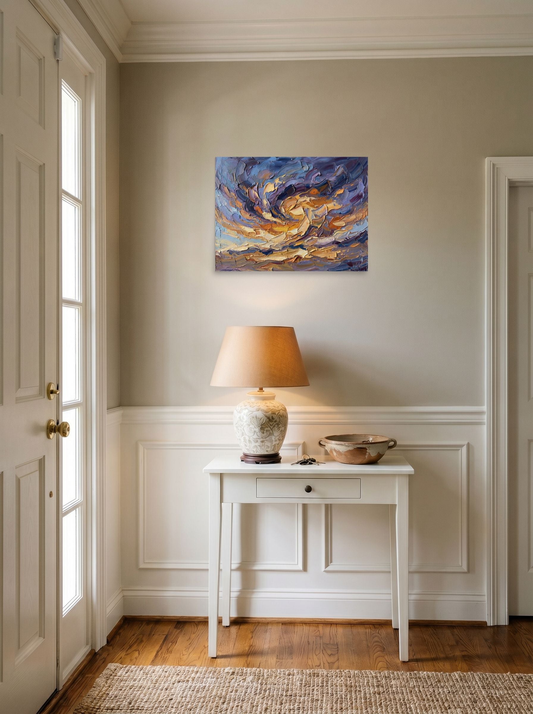 A 24x18 inch unframed paper Abstract expressionism print of 'Swirling Twilight Skies' hanging in an entryway near a console.