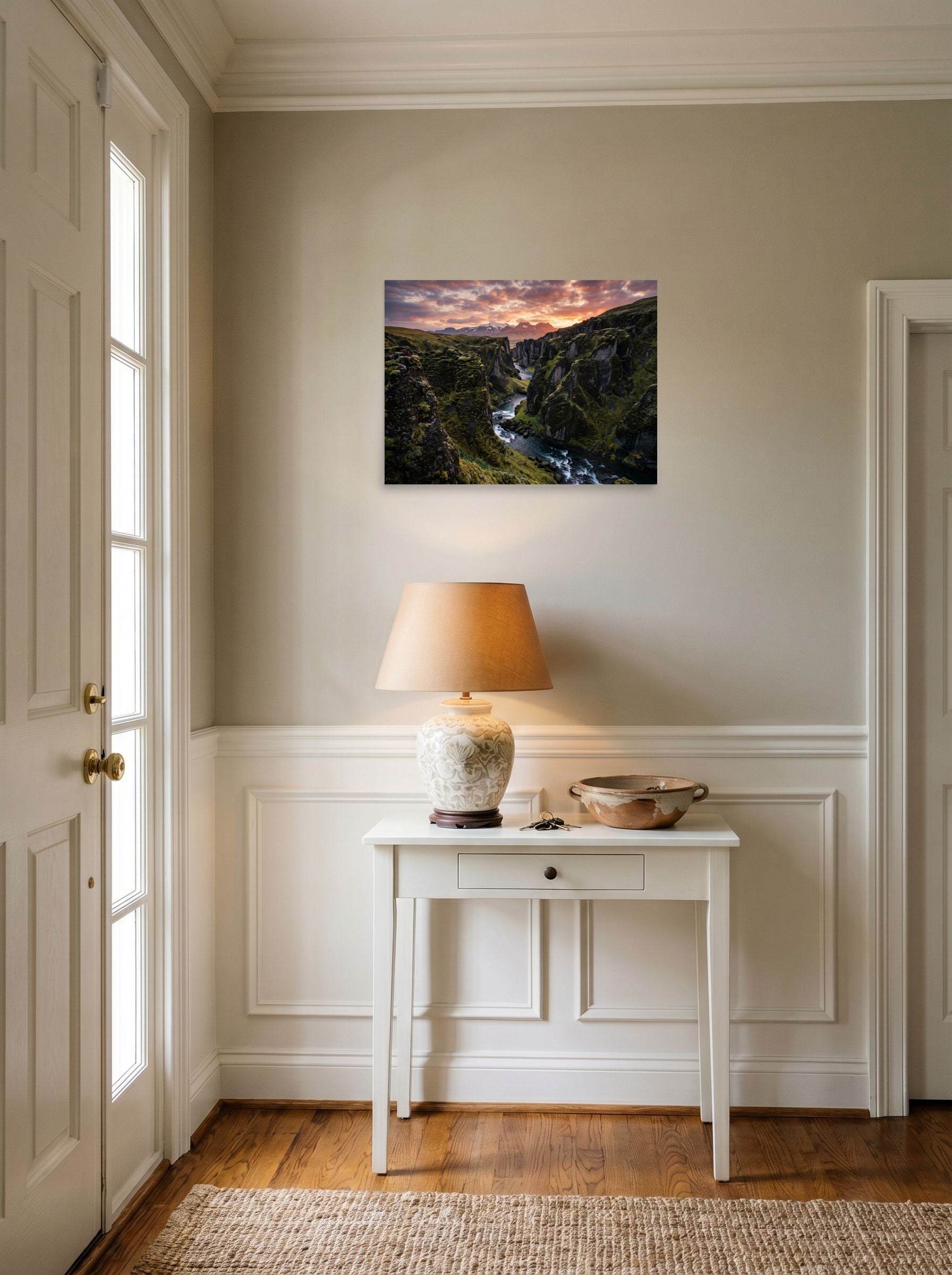 A 24x18 inch unframed paper Art photography print of 'Canyon of the Dawn' hanging in an entryway near a console.