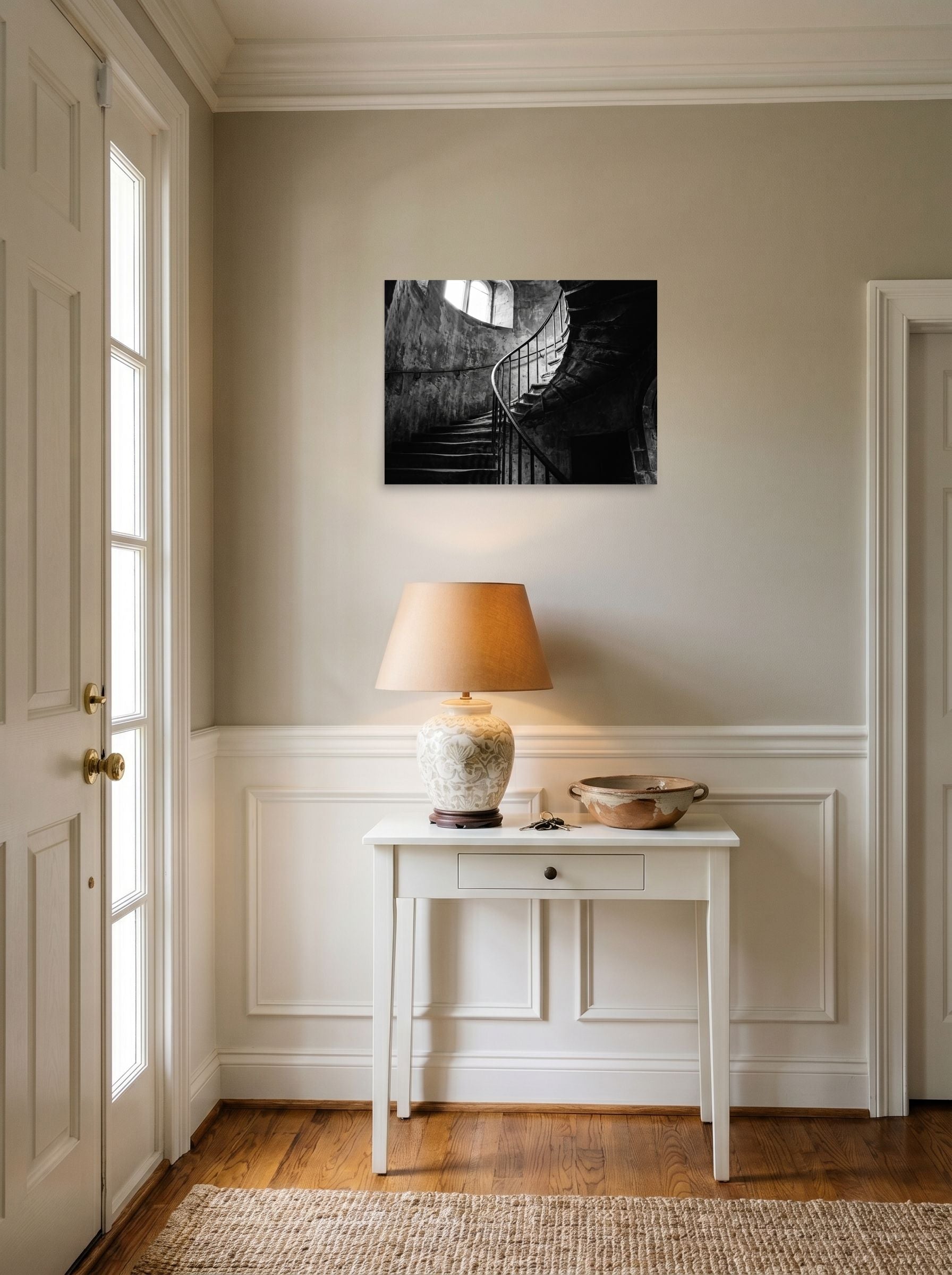 A 24x18 inch unframed paper Art photography print of 'Ascending Shadows' hanging in an entryway near a console.