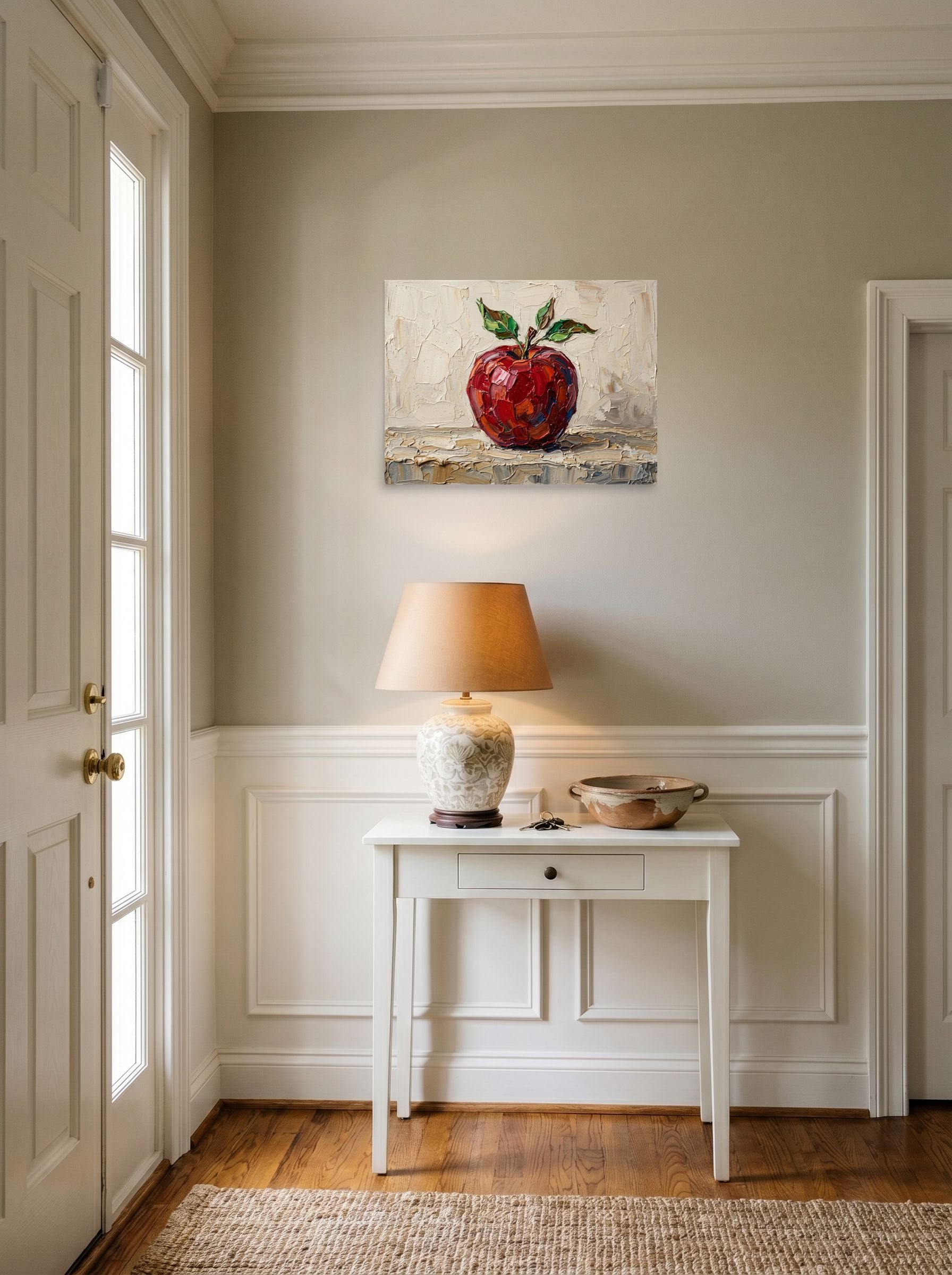 A 24x18 inch unframed paper Impressionism print of 'The Impasto Apple' hanging in an entryway near a console.