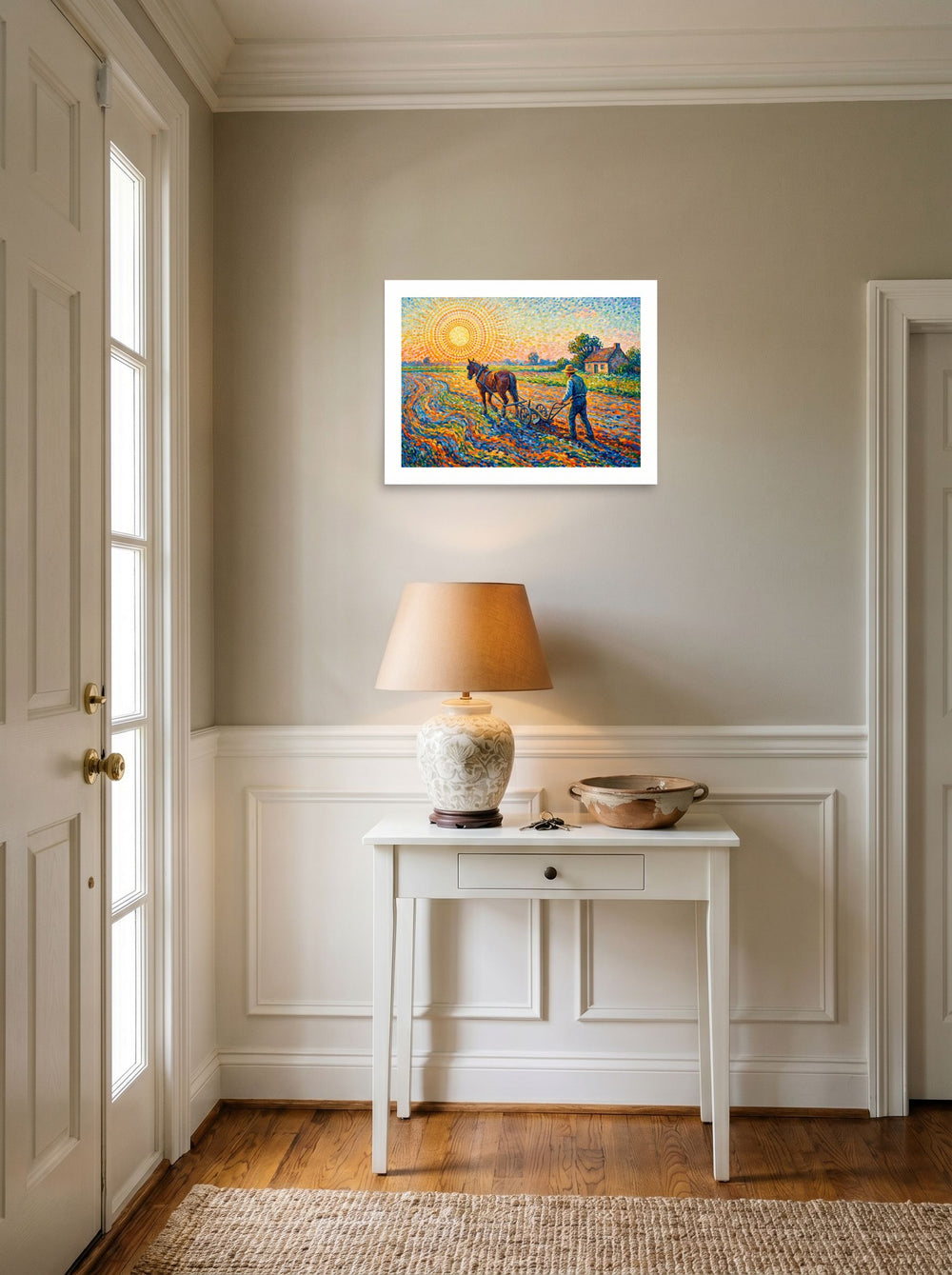 A 24x18 inch unframed paper Pointillism print of 'The Radiant Field', set against a bright entryway wall.