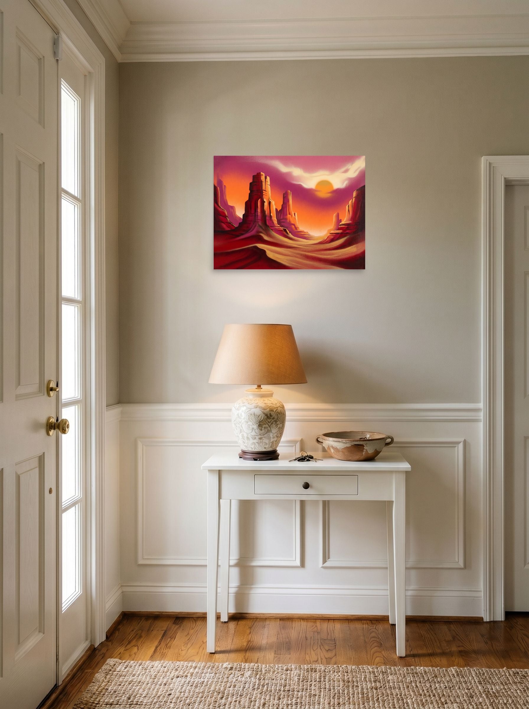 A 24x18 inch unframed paper Realism print of 'Crimson Canyons' hanging in an entryway near a console.