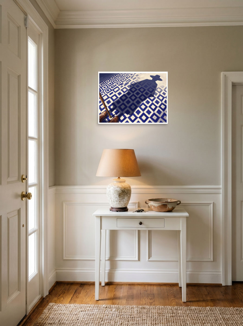 A 24x18 inch unframed paper Realism,Magic realism print of 'Shadow of the Traveler' hanging in an entryway near a console.