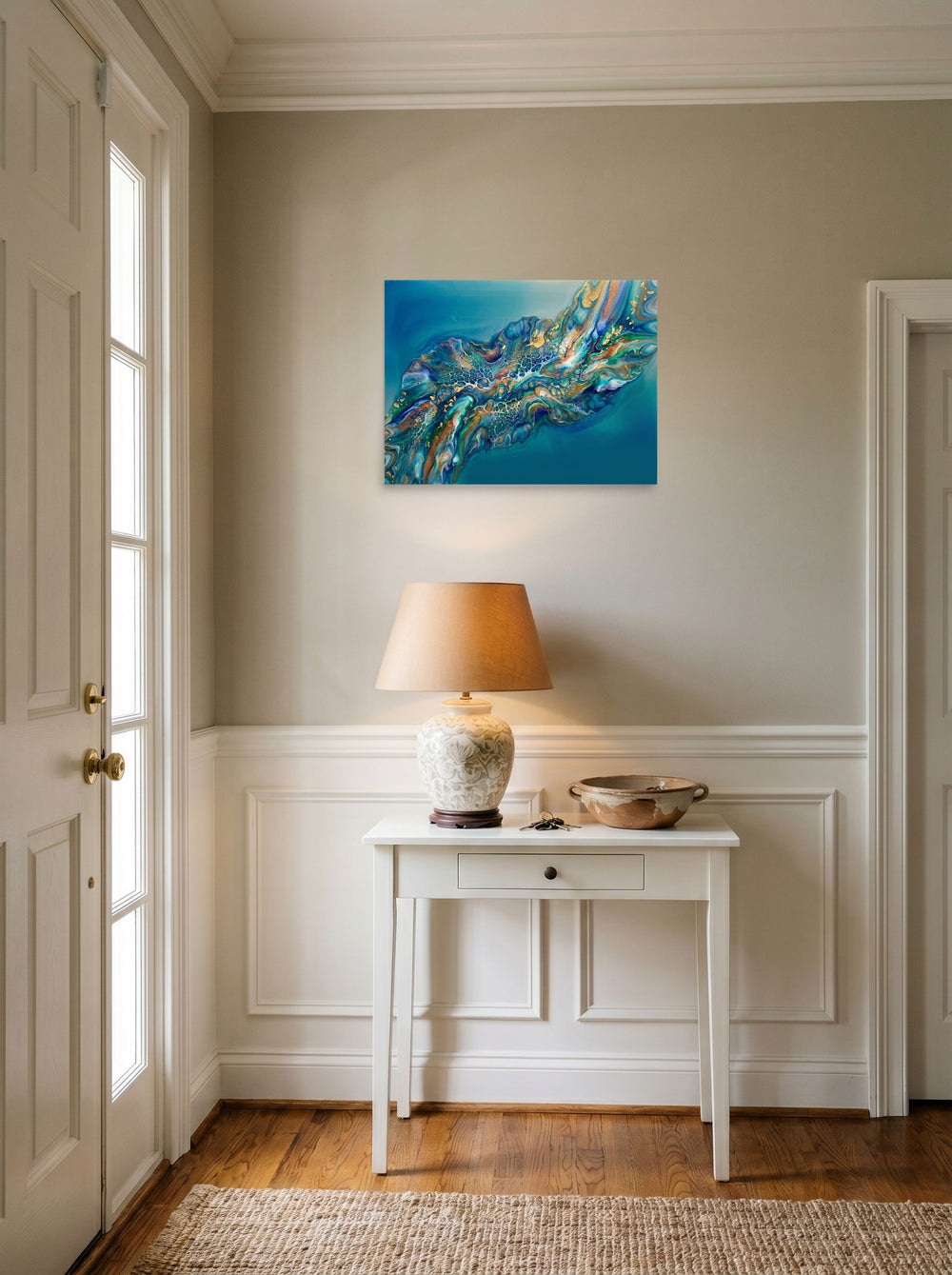 A 24x18 inch unframed paper Abstract art print of 'Teal Nebula' hanging in an entryway near a console.