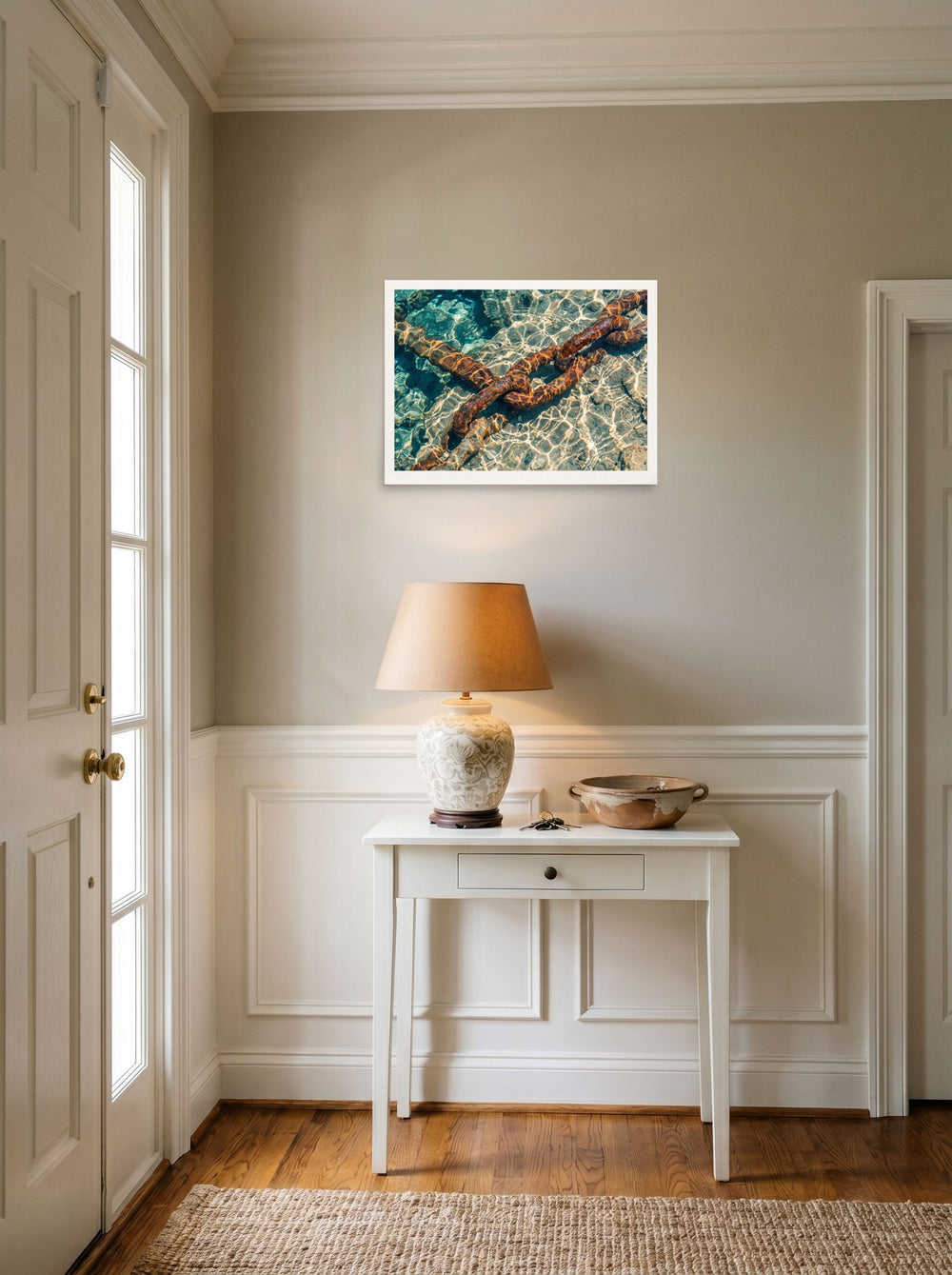 A 24x18 inch unframed paper Art photography print of 'Sunken Mooring Chain' hanging in an entryway near a console.