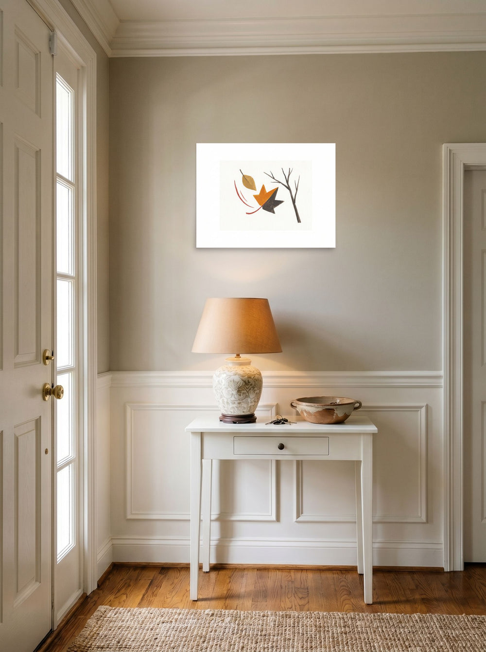A unframed paper print of the Minimalism artwork 'The Final Leaf', hanging in an entryway near a console.