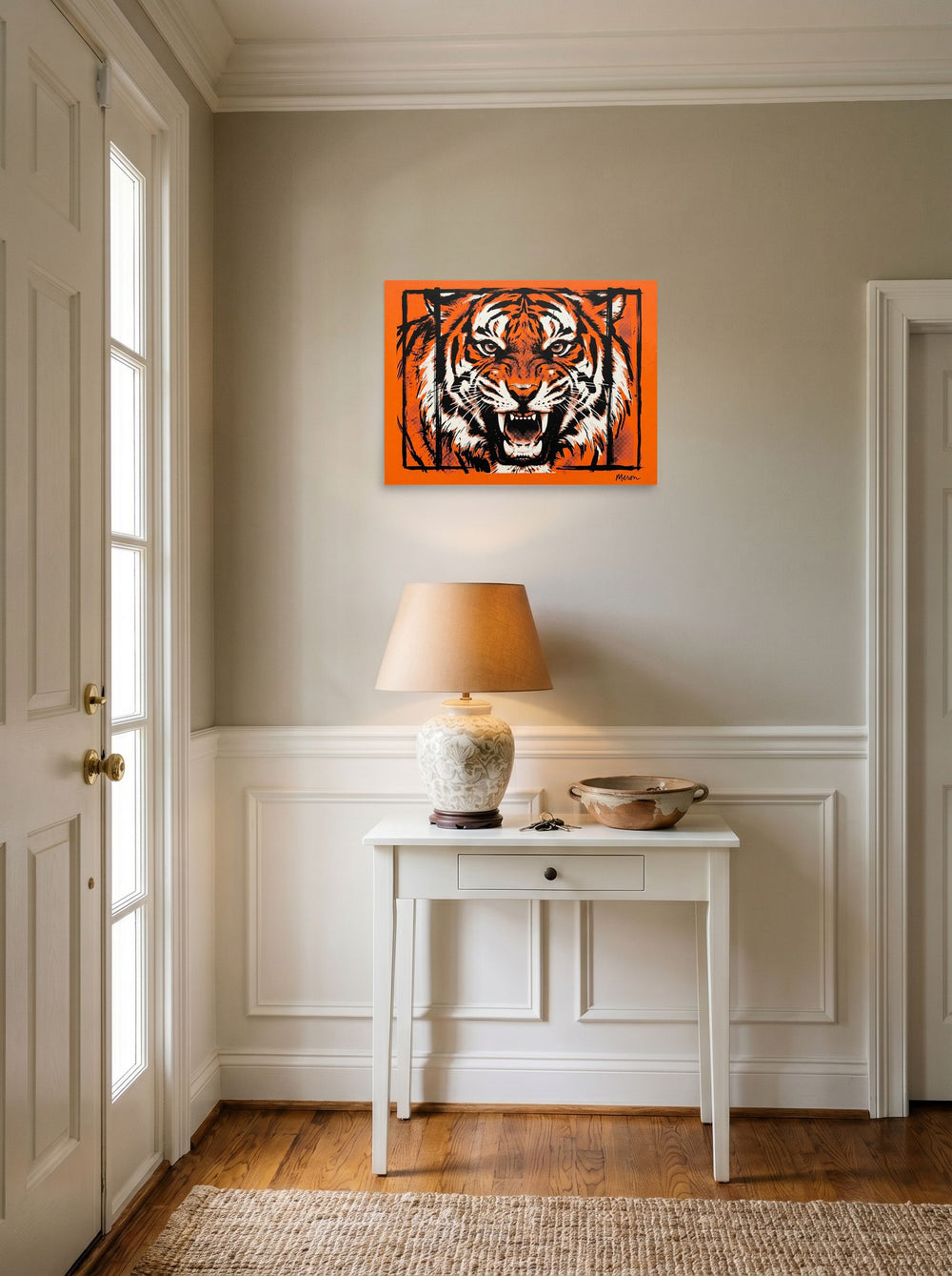 A 24x18 inch unframed paper Pop art print of 'Fierce Roar' hanging in an entryway near a console.