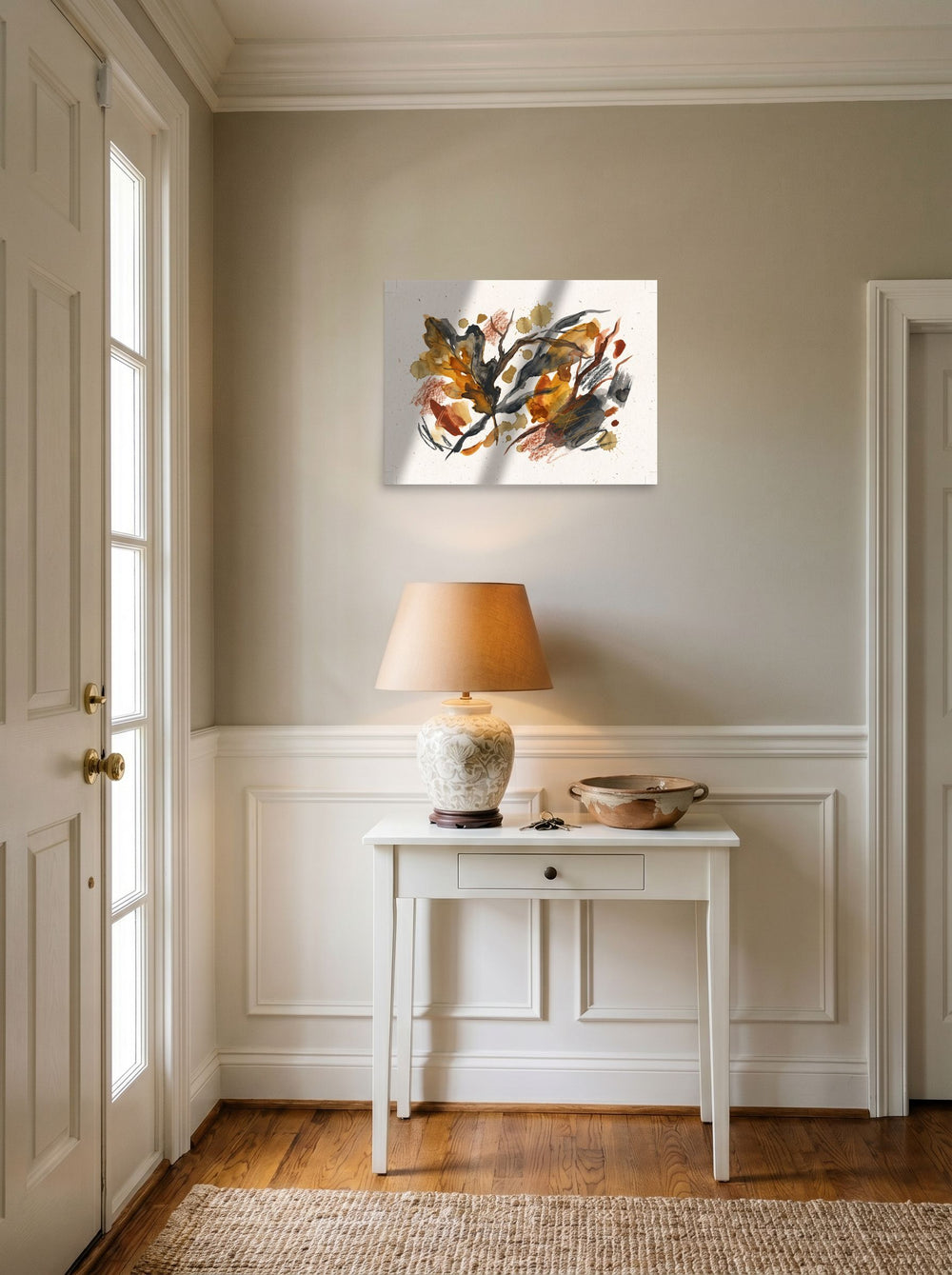 A unframed paper print of the Dau-al-Set artwork 'Autumnal Reverie', hanging in an entryway near a console.