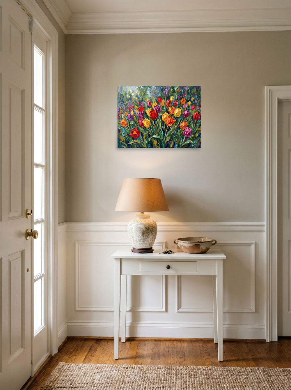 A 24x18 inch unframed paper Impressionism print of 'Tulip Symphony' hanging in an entryway near a console.