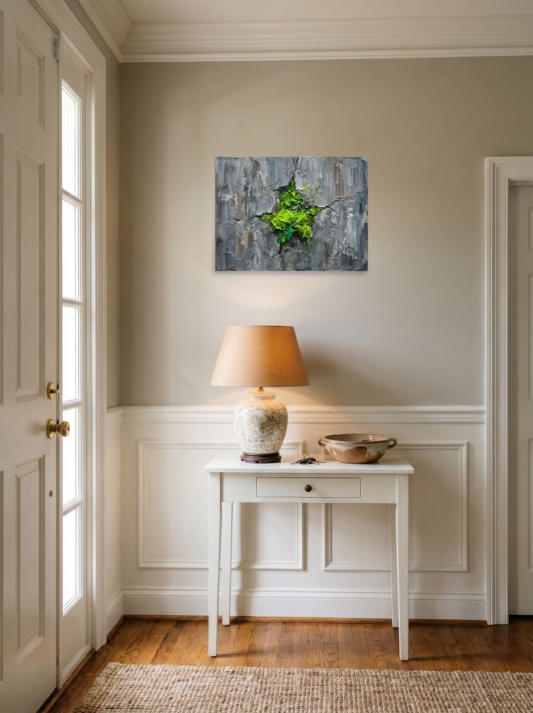 A 24x18 inch unframed paper Realism print of 'Life Finds a Way' hanging in an entryway near a console.