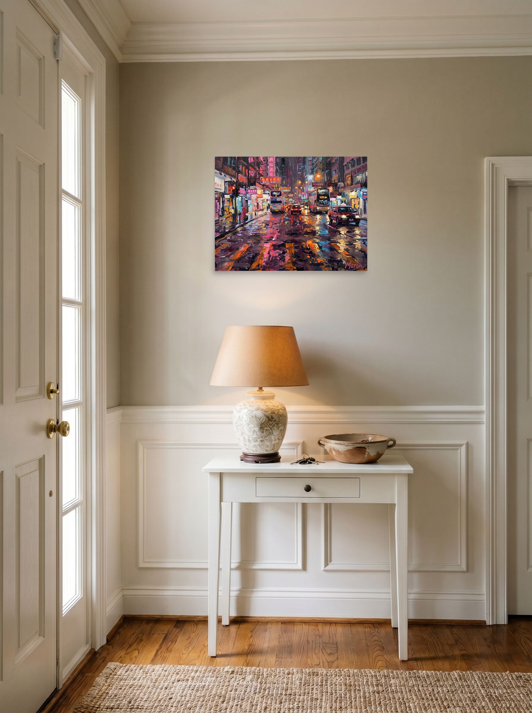 A 24x18 inch unframed paper Impressionism print of 'Neon Night Reflections' hanging in an entryway near a console.