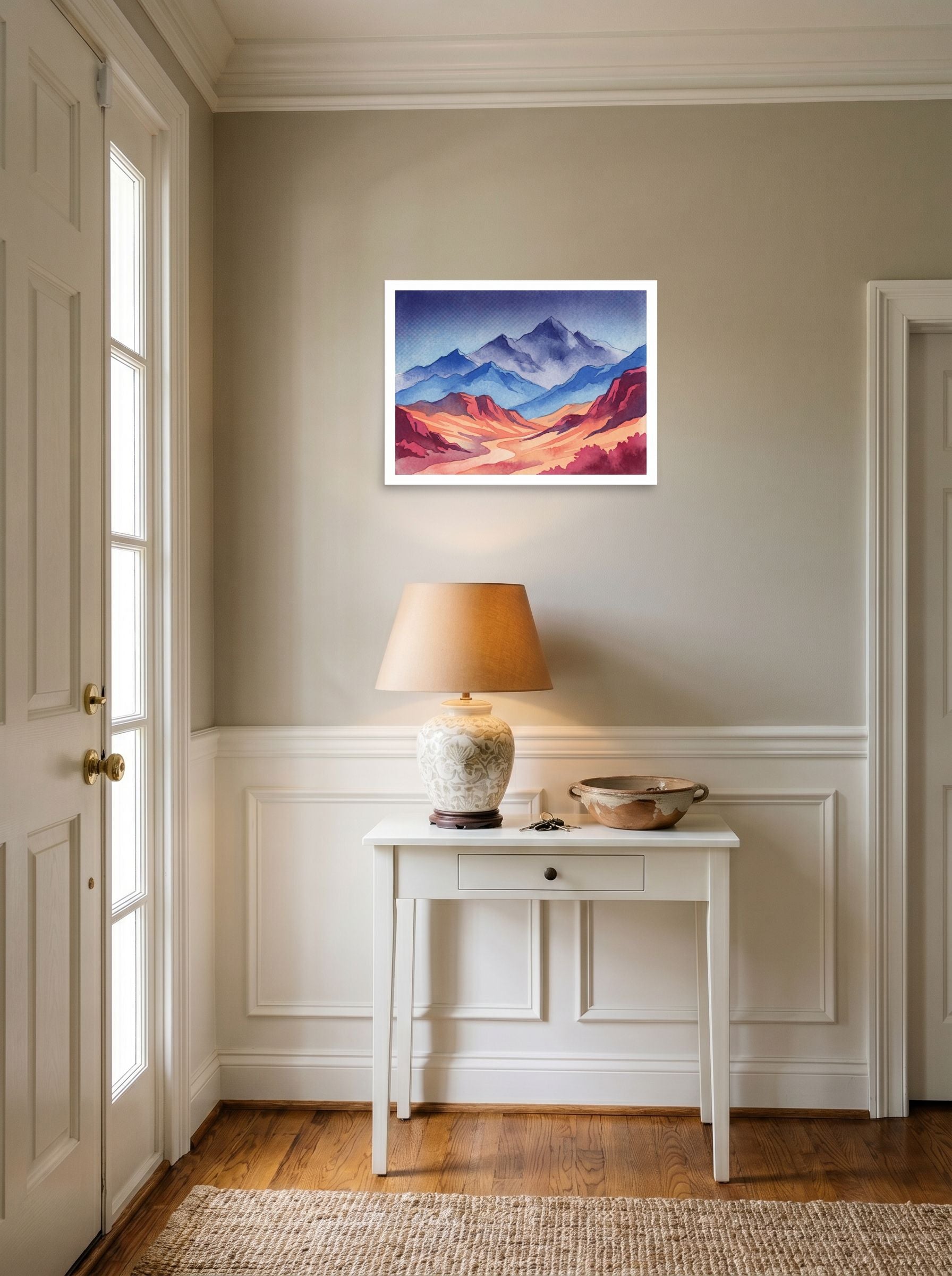 A 24x18 inch unframed paper Realism print of 'Mountain Dawn' hanging in an entryway near a console.