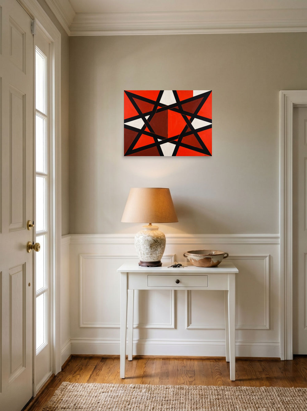 The Constructivism print 'Prismatic Intersect', 24x18 inch unframed paper, hanging in an entryway near a console.
