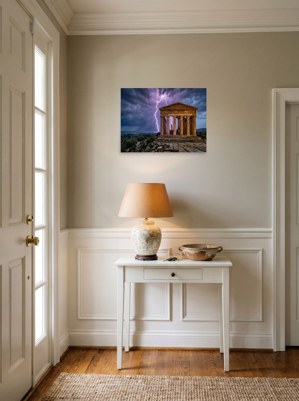 A 24x18 inch unframed paper Art photography print of 'Wrath of Olympus' hanging in an entryway near a console.