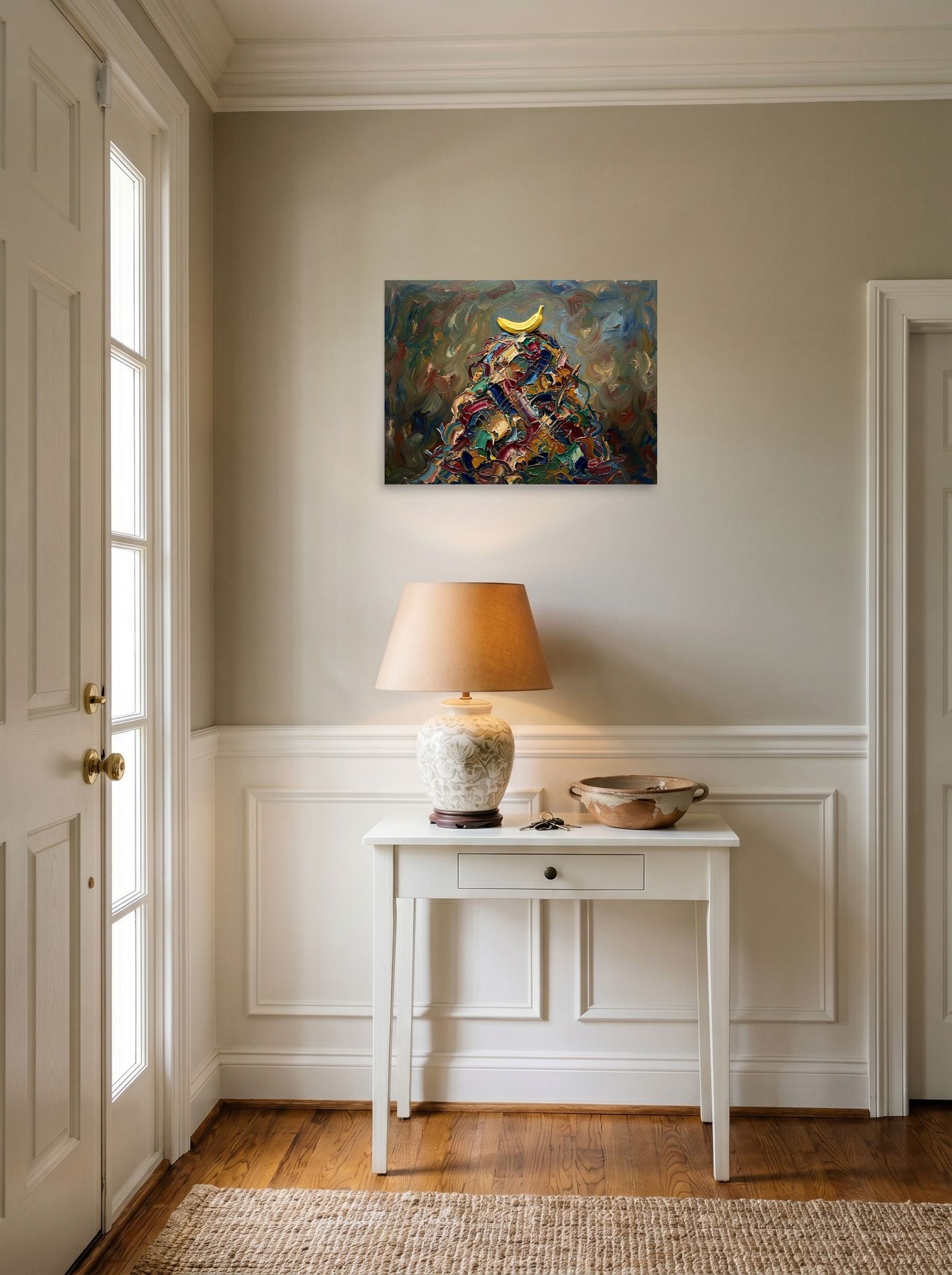 A 24x18 inch unframed paper Expressionism print of 'The Pinnacle' hanging in an entryway near a console.
