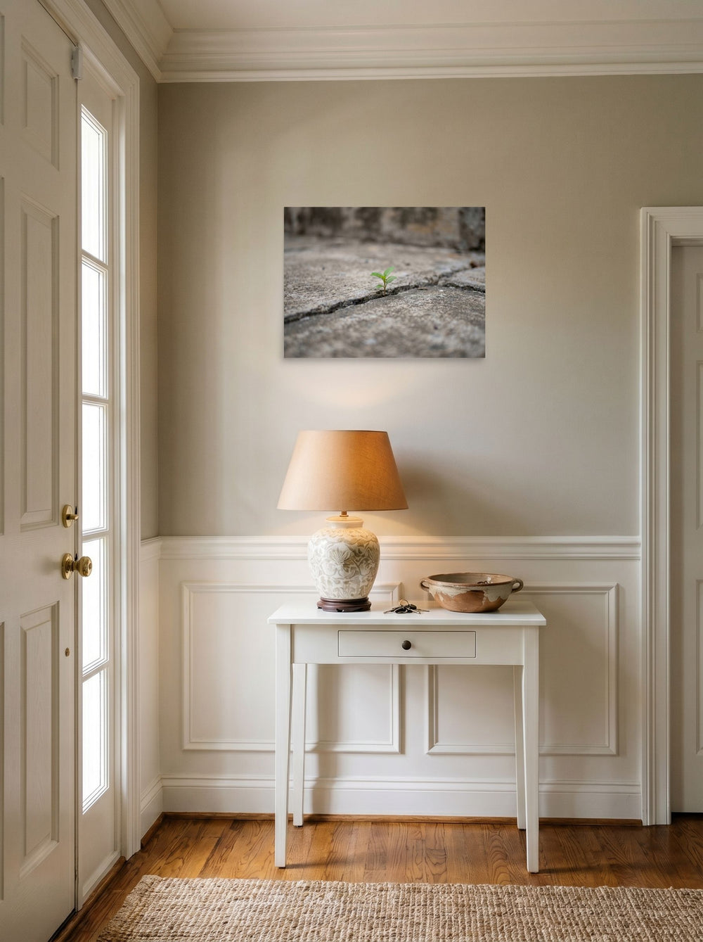 A 24x18 inch unframed paper Art photography print of 'Concrete Resilience' hanging in an entryway near a console.