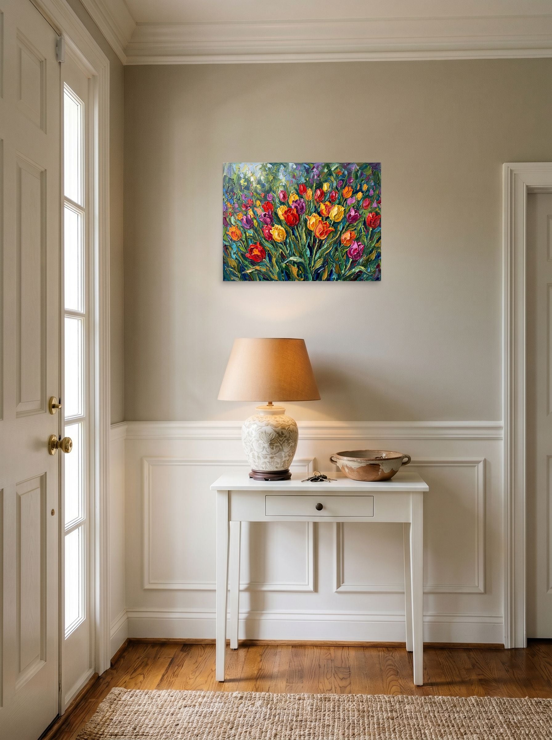 A 24x18 inch unframed paper Impressionism print of 'Tulip Symphony' hanging in an entryway near a console.