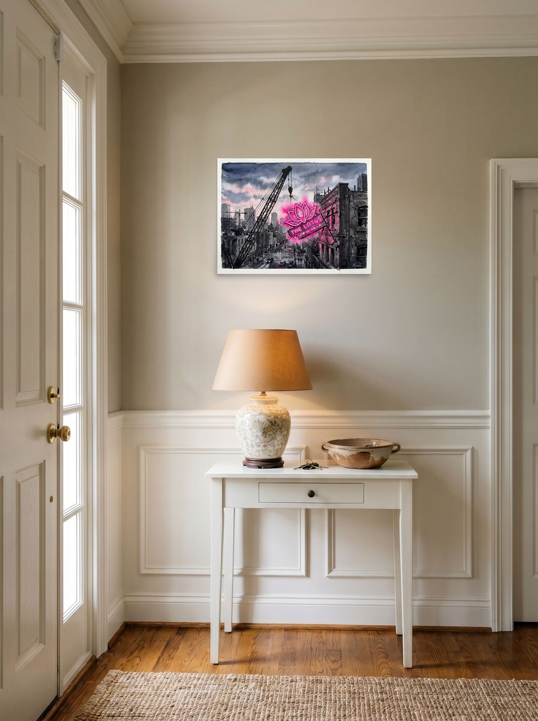 A 24x18 inch unframed paper Realism,Street art print of 'The Lotus Sign' hanging in an entryway near a console.