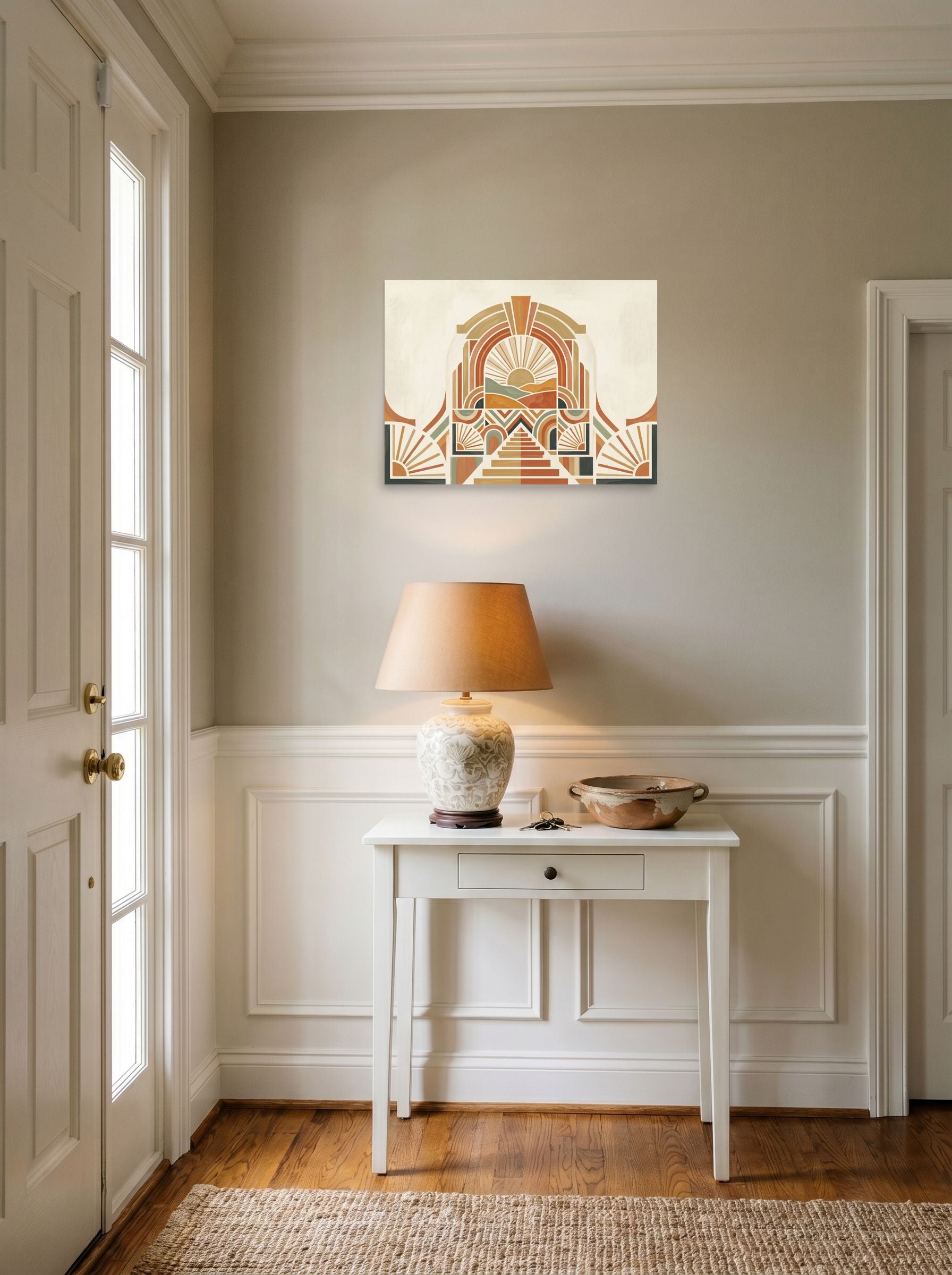 A 24x18 inch unframed paper Art Deco,Geometric abstract art print of 'Art Deco Desert Sunrise' hanging in an entryway near a console.