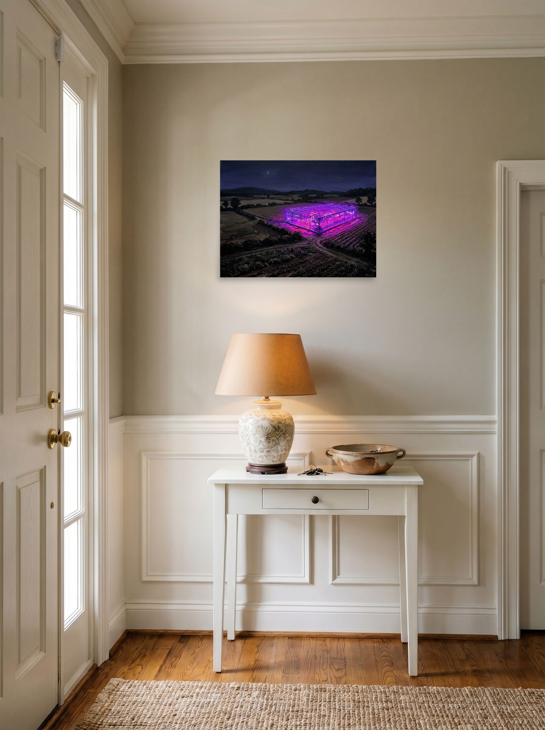A 24x18 inch unframed paper Magic realism,Impressionism print of 'Midnight Purple Harvest' hanging in an entryway near a console.