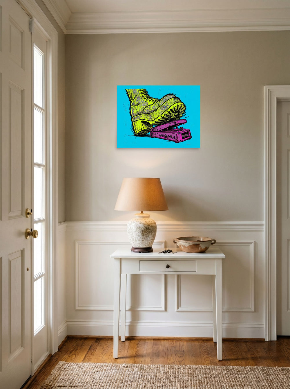 A 24x18 inch unframed paper Pop art print of 'Stomp the Fuzz' hanging in an entryway near a console.