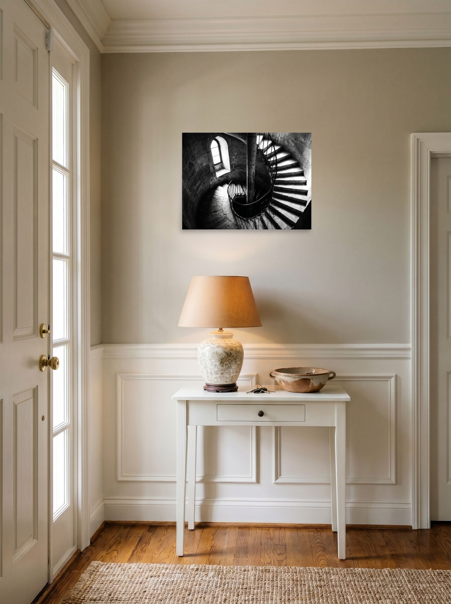 A 24x18 inch unframed paper Art photography print of 'Descent into Light' hanging in an entryway near a console.