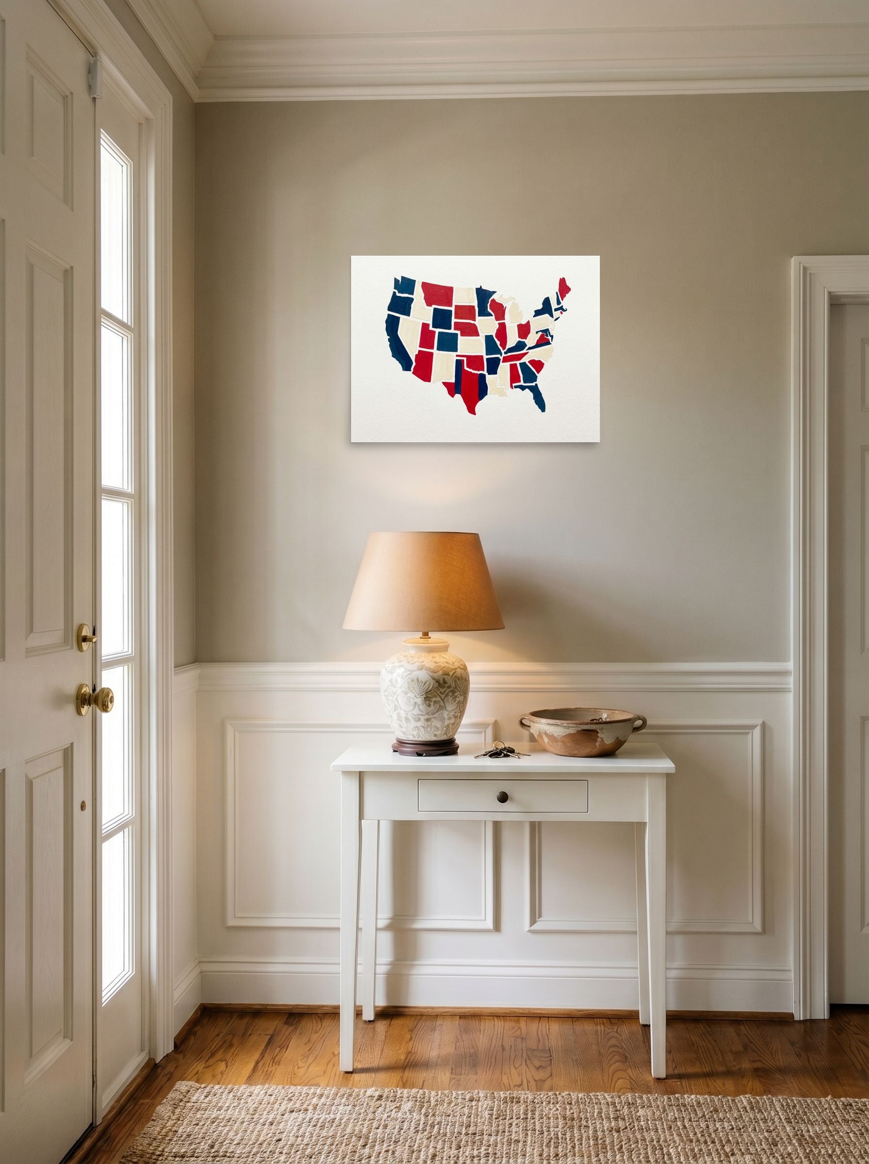 A 24x18 inch unframed paper Abstract art,Pop art print of 'The Patchwork States' hanging in an entryway near a console.