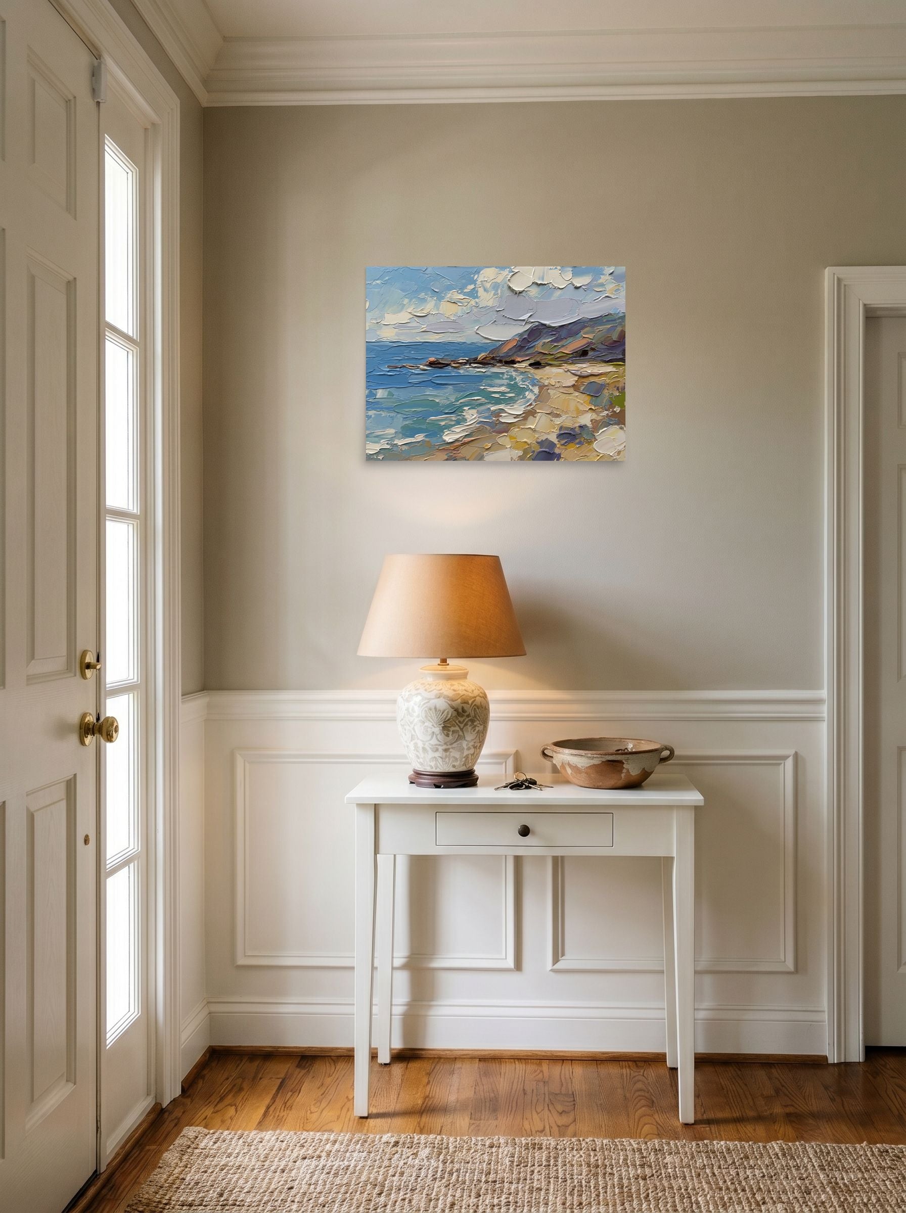 A 24x18 inch unframed paper Impressionism print of 'Impasto Coastline' hanging in an entryway near a console.