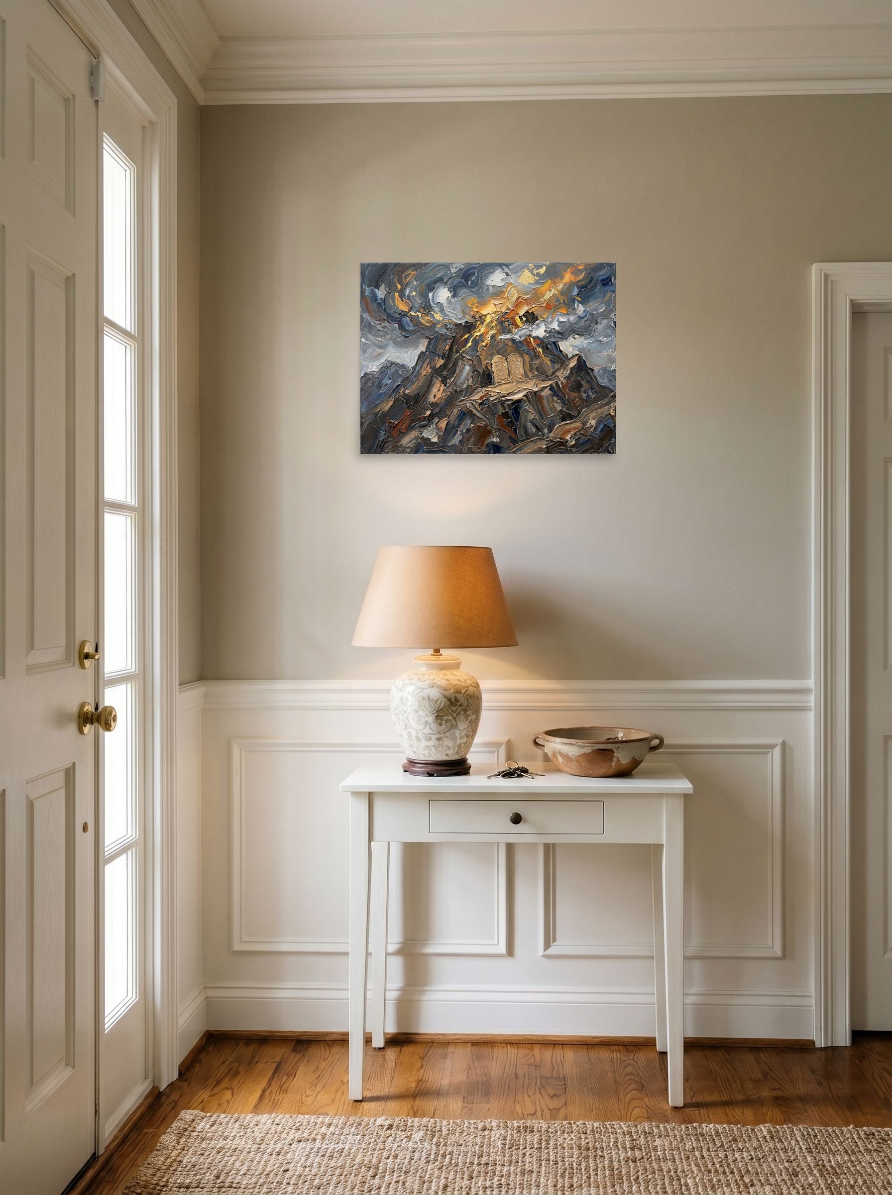 A 24x18 inch unframed paper Symbolism print of 'The Covenant on Sinai' hanging in an entryway near a console.