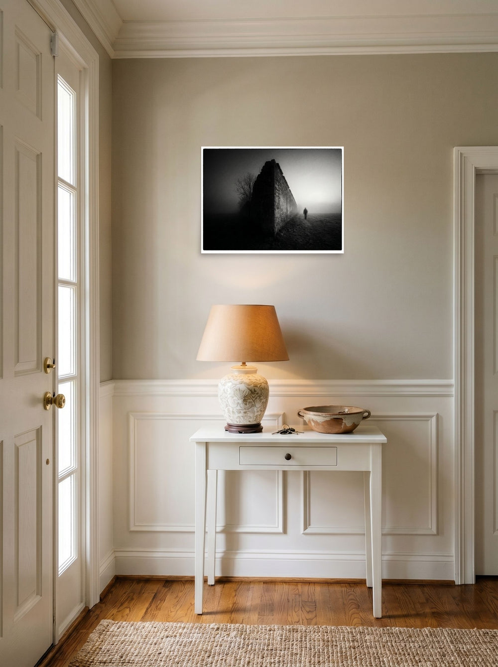 A 24x18 inch unframed paper Art photography print of 'Echoes in the Mist' hanging in an entryway near a console.
