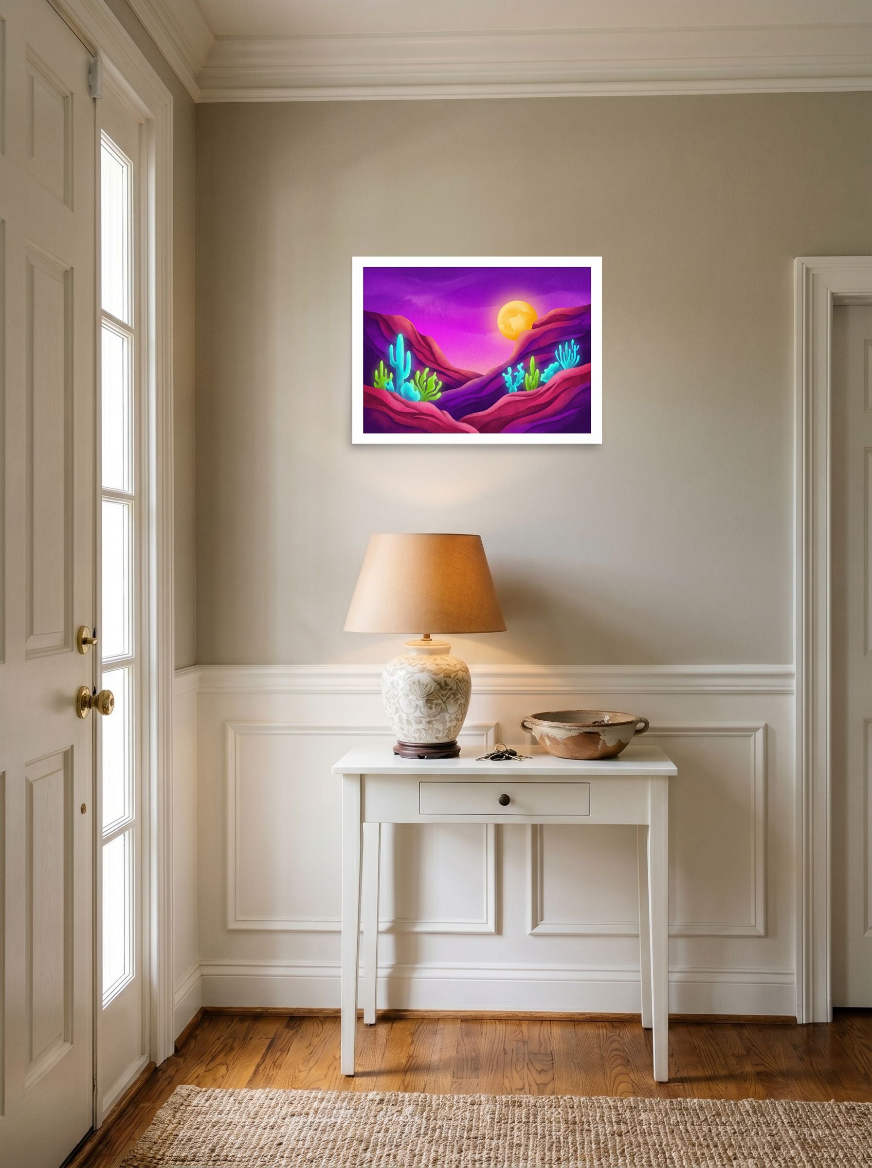 A 24x18 inch unframed paper Surrealism,Psychedelic art print of 'Bioluminescent Desert' hanging in an entryway near a console.