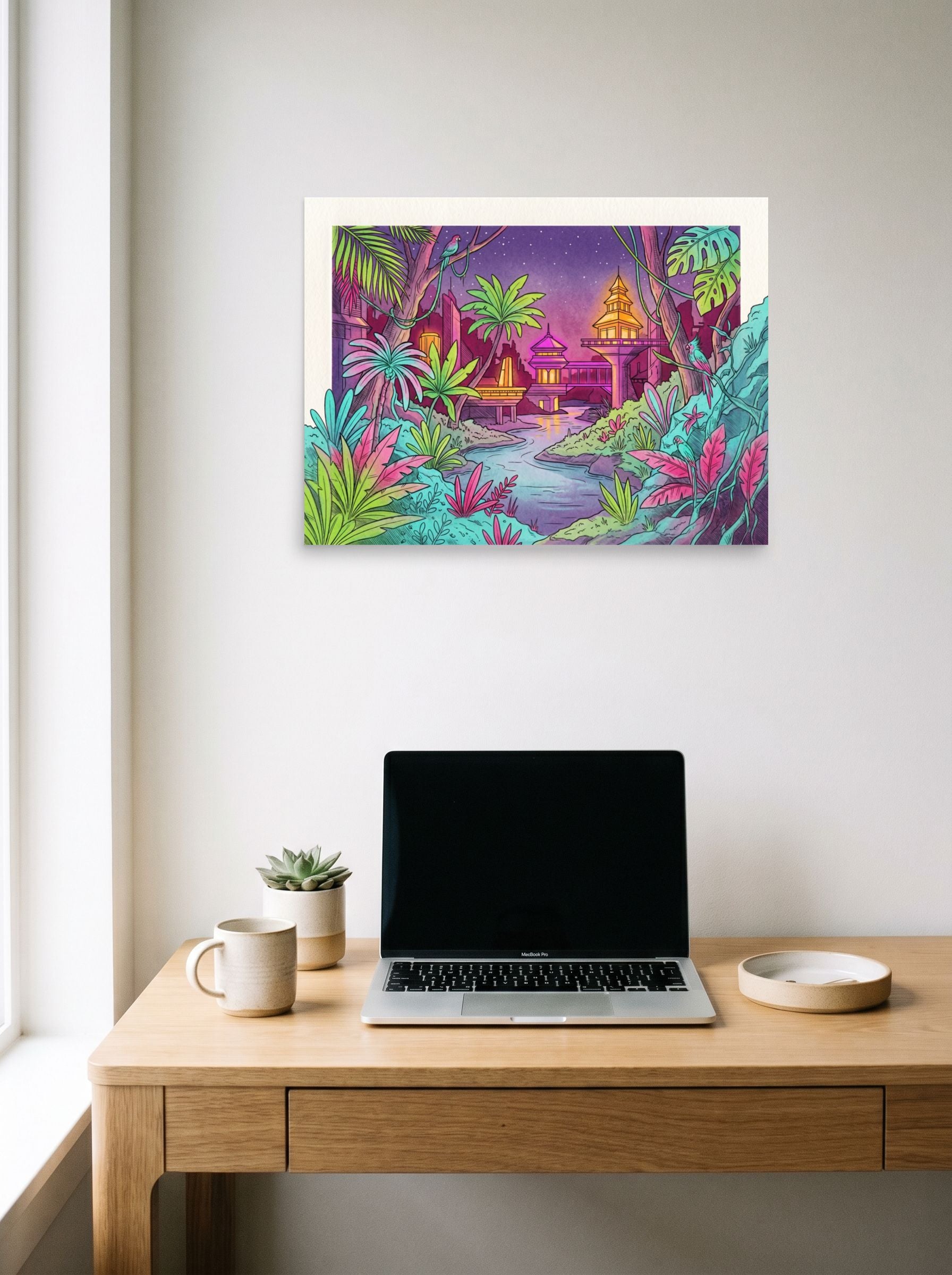 A 24x18 inch unframed paper Retrofuturism,Psychedelic art print of 'Neon Nights in the Jungle' hanging above a worktable with a laptop.